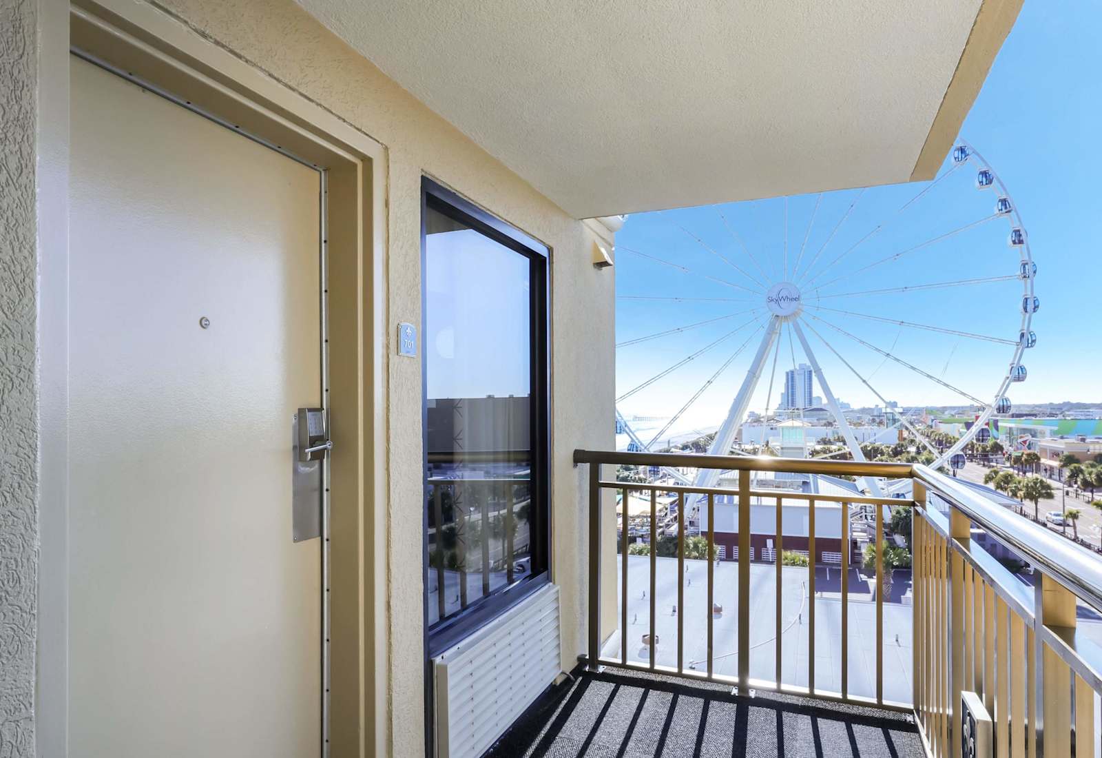 Step outside your door to stunning views of the Myrtle Beach SkyWheel and boardwalk excitement. This unique balcony offers a front-row seat to the fun, perfect for people-watching and soaking in the vibrant coastal energy.