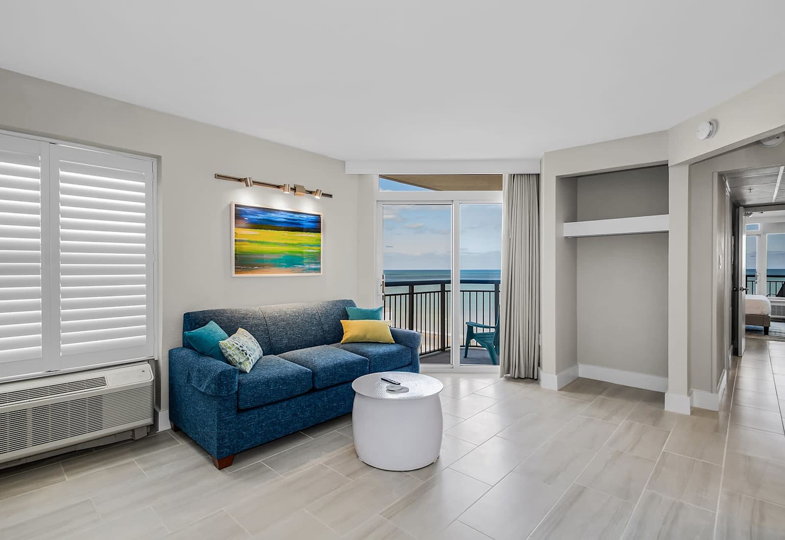 This cozy corner is perfect for unwinding. Step out onto the balcony to feel the sea breeze or relax inside while enjoying scenic views and soothing ambiance.