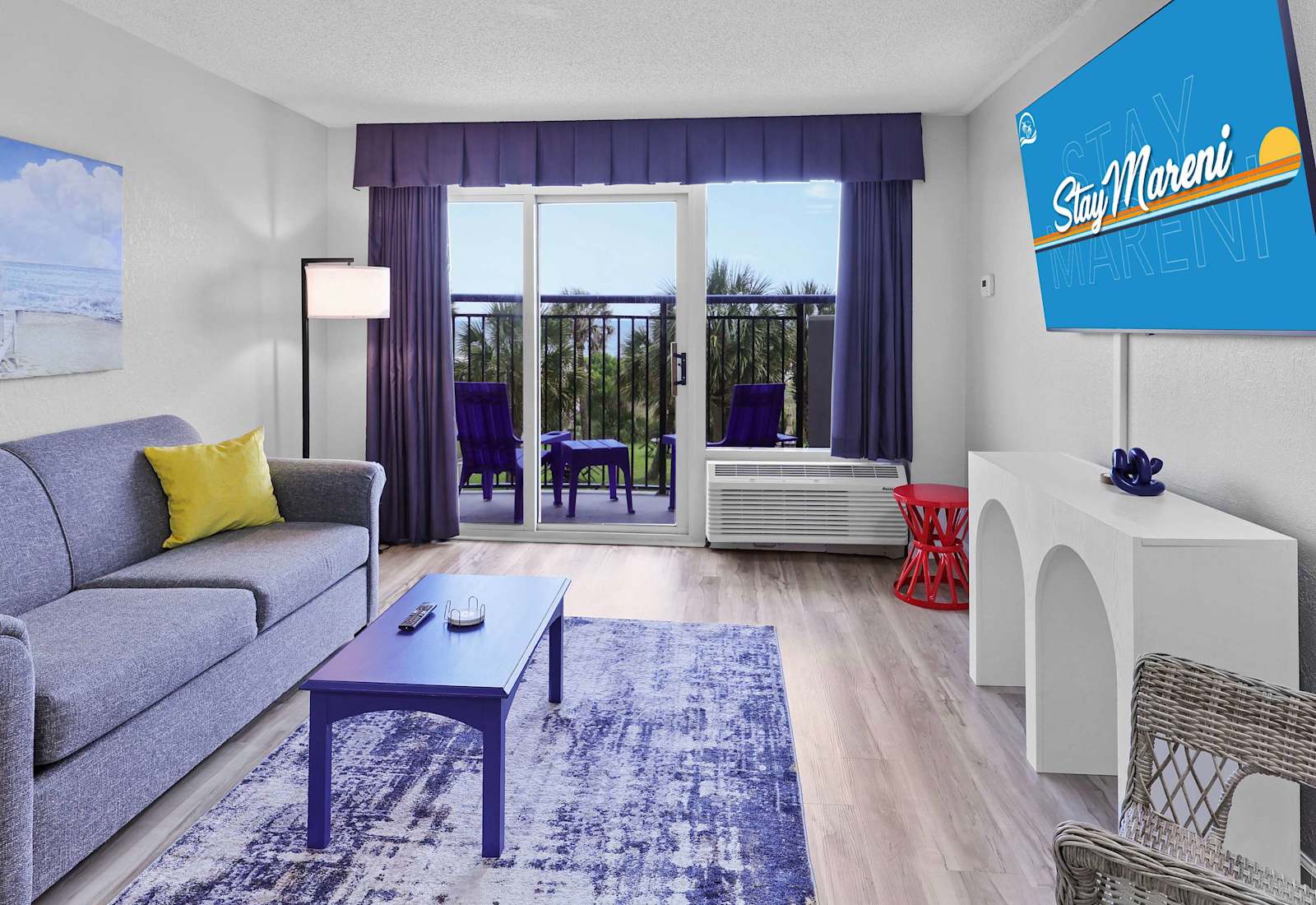 Breathe in ocean air from your private balcony, unwind in this bold, beach-chic living room, and catch golden sunsets on the smart TV—or in real life. Colorful, cozy, and just steps from the sand!