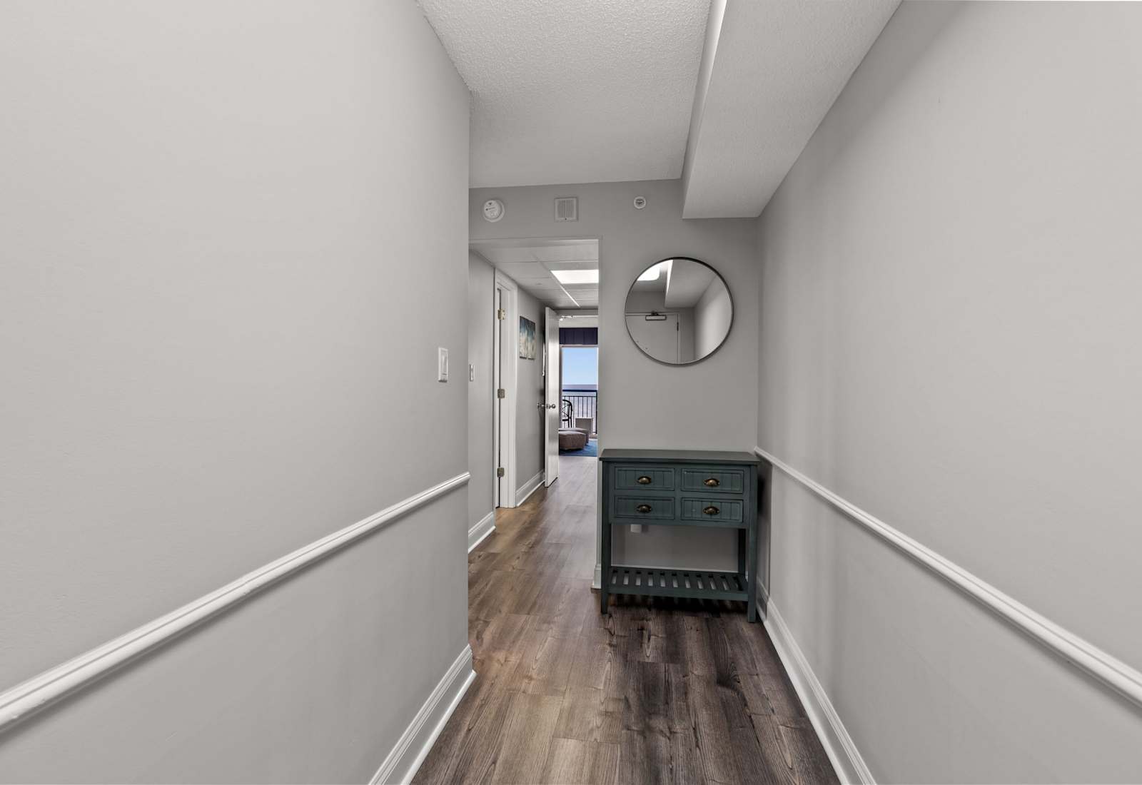 Spacious entryway with plenty of storage space and a view of the ocean. 
