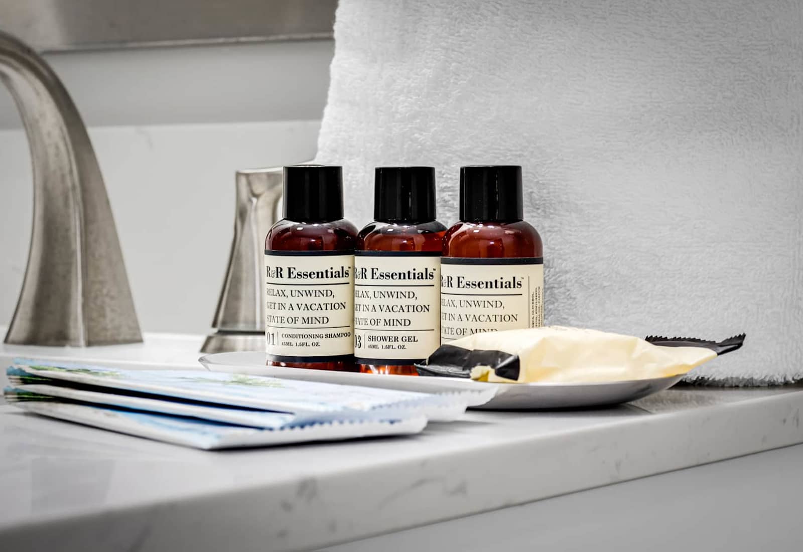 Pamper yourself with our R&R Essentials toiletries, expertly curated to enhance your relaxation. Featuring conditioning shampoo, shower gel, and more, each product promises a luxurious experience to leave you refreshed and in a perfect vacation state