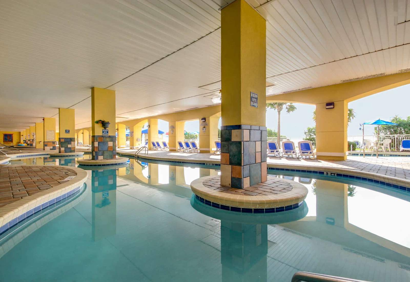 Unwind in this charming indoor pool area, featuring serene water features and comfortable seating. Perfect for a relaxing swim or simply enjoying the peaceful atmosphere.