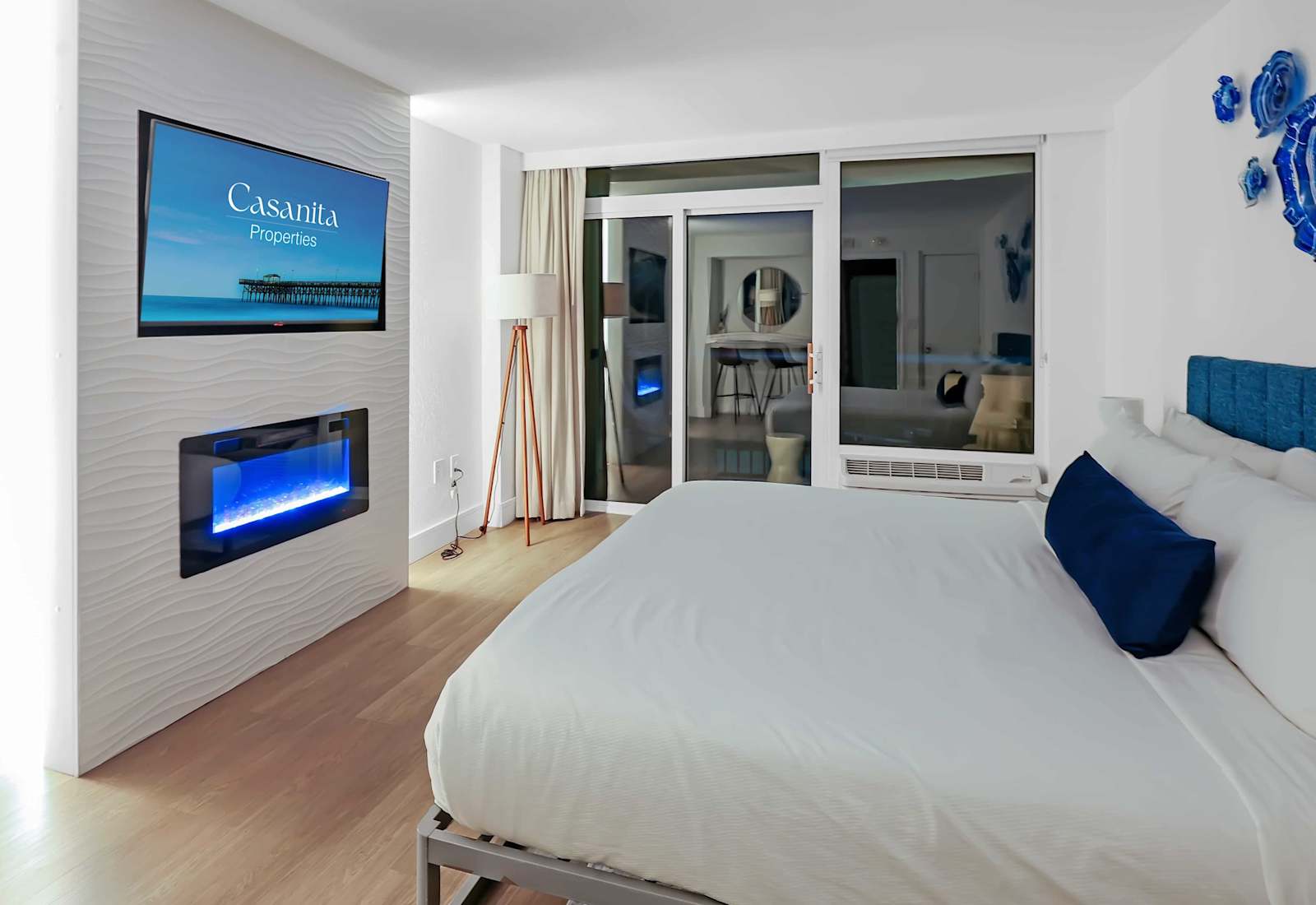 Enjoy a clean and inviting Myrtle Beach retreat featuring a plush bed, smart TV, fireplace, and easy access to your private balcony.