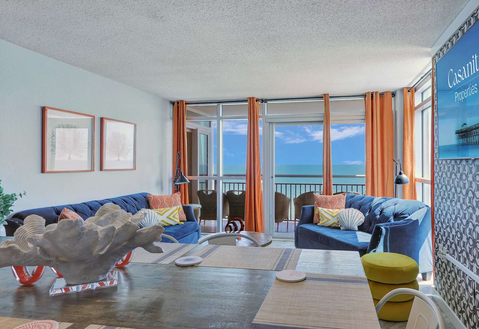 Make beach memories in this vibrant, ocean-view retreat with cozy seating, games, and space for everyone to unwind.