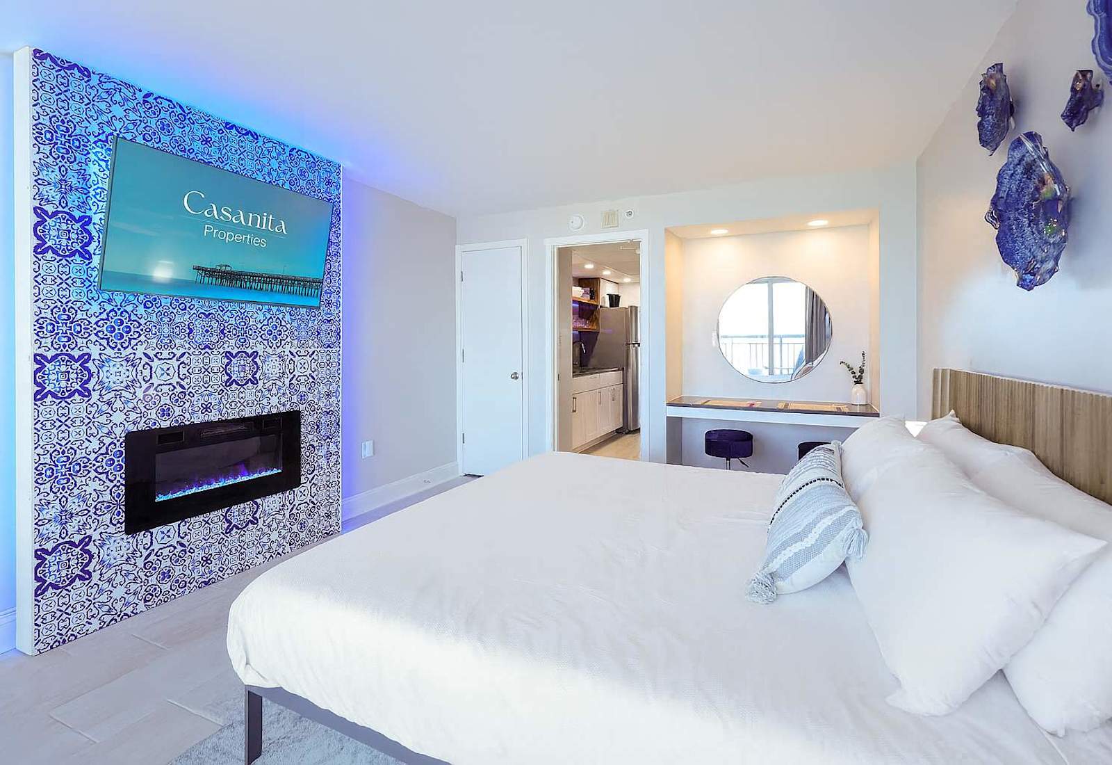 Experience coastal luxury in this stylish oceanfront suite—featuring a cozy electric fireplace, glam vanity, and beachy vibes throughout. The perfect blend of comfort, elegance, and unforgettable views awaits!

