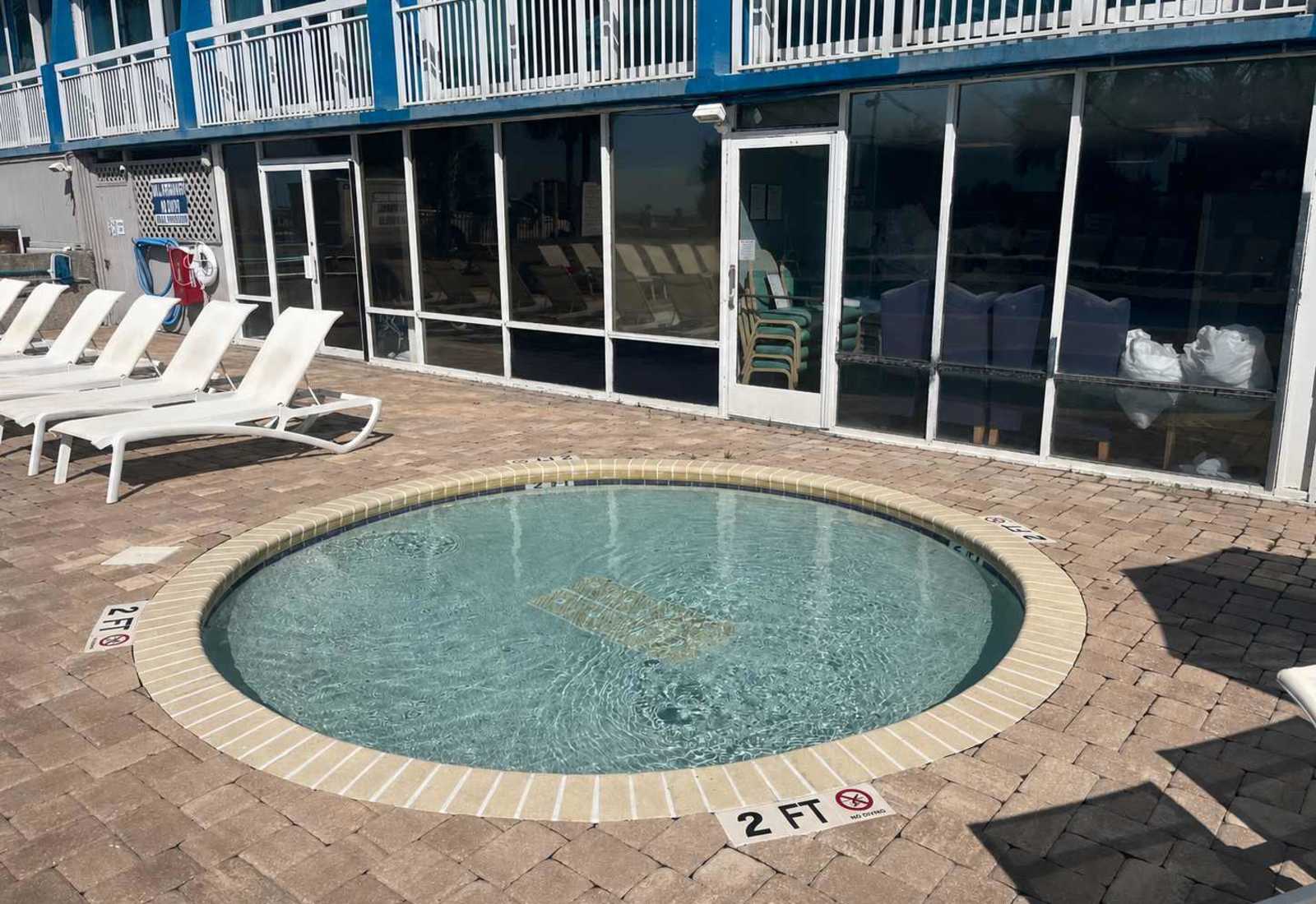 Little ones can splash safely in the shallow kiddie pool while parents relax nearby, making it the perfect spot for family fun under the Myrtle Beach sun.