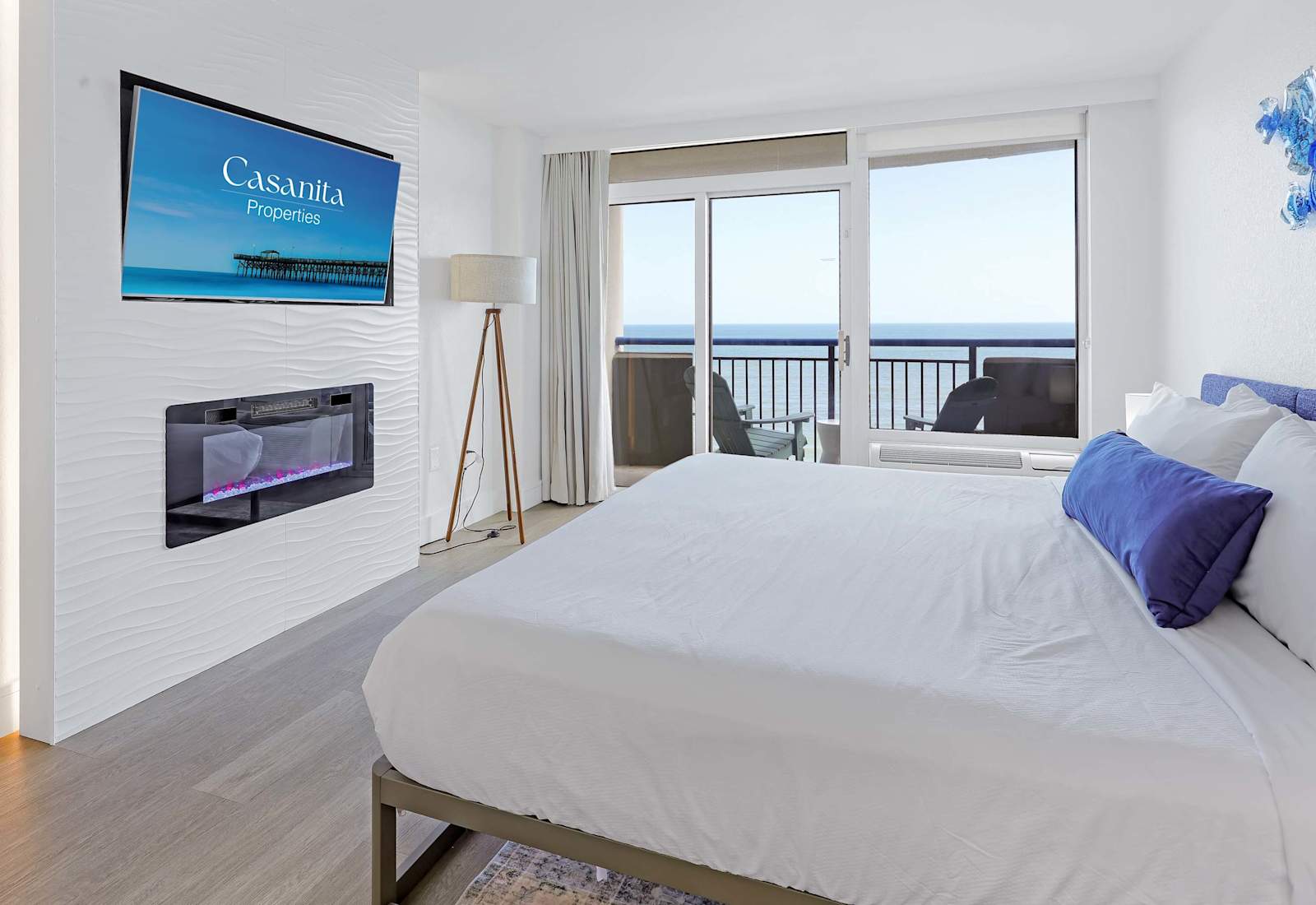 Drift off to sleep in a cozy and stylish bedroom with a comfortable king-sized bed and soft lighting and a beautiful Ocean View!