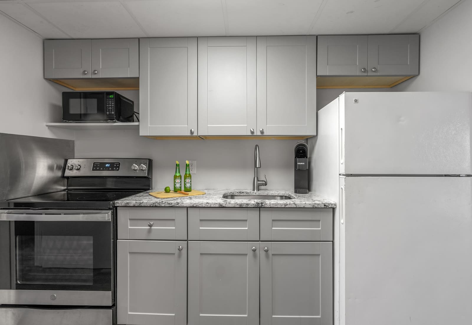 Fully-equipped kitchen with stainless steel appliances, perfect for cooking up a storm. 
