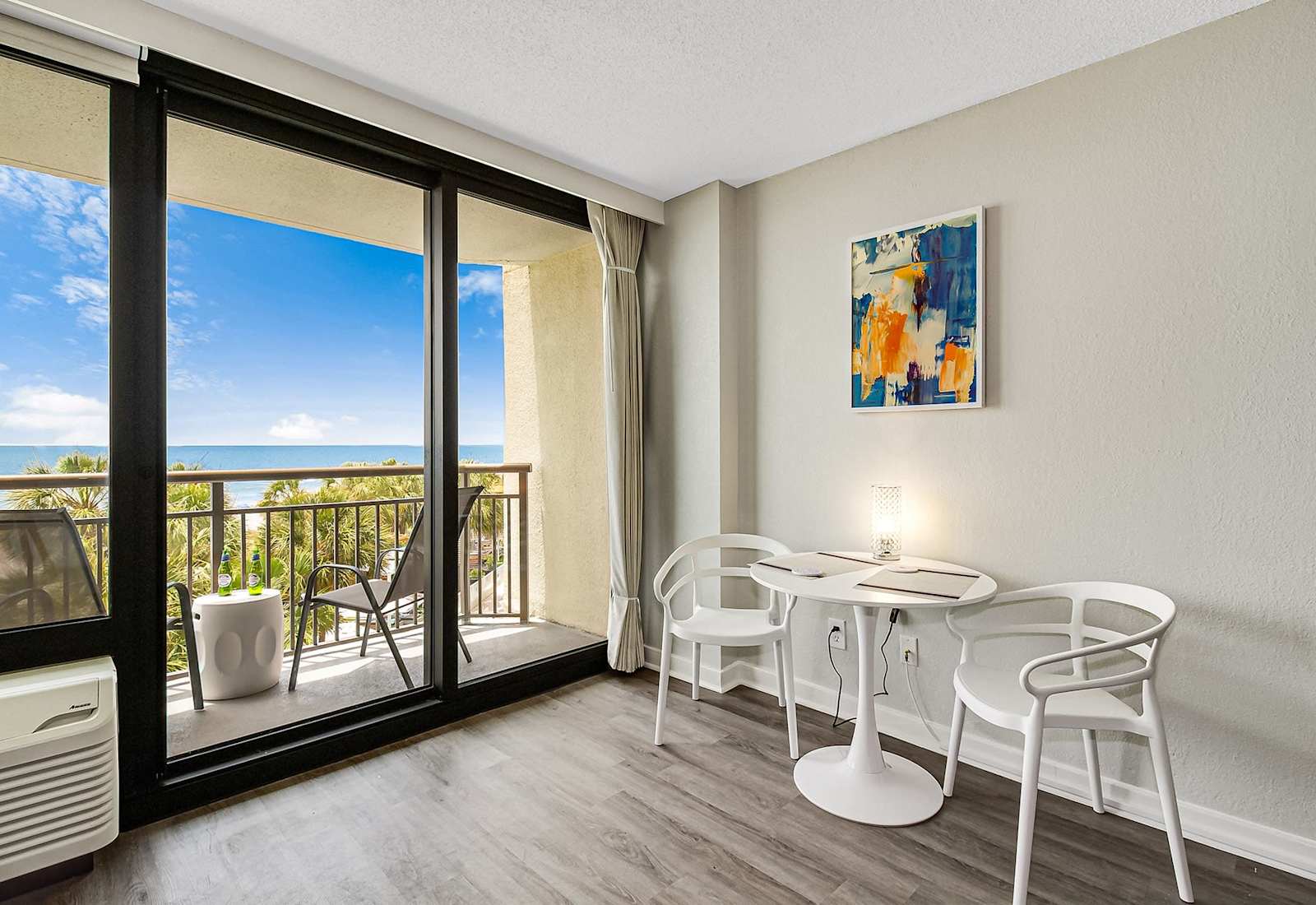 Dine with a view or catch up on work in this bright and modern nook, just steps from your private balcony. Natural light and ocean breezes make every moment feel like a getaway.