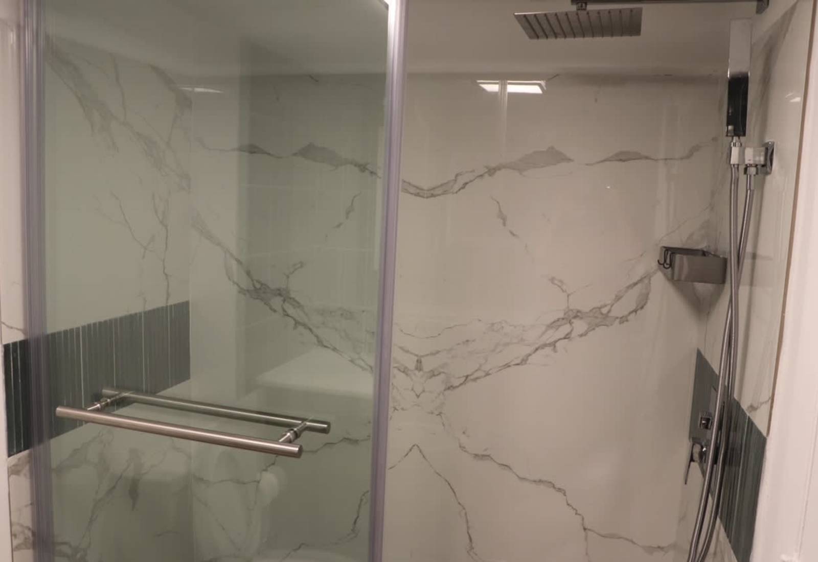 Full bathroom equipped with a Smart Vanity Mirror - it offers three different LED brightness settings, and a built in de-fogger!