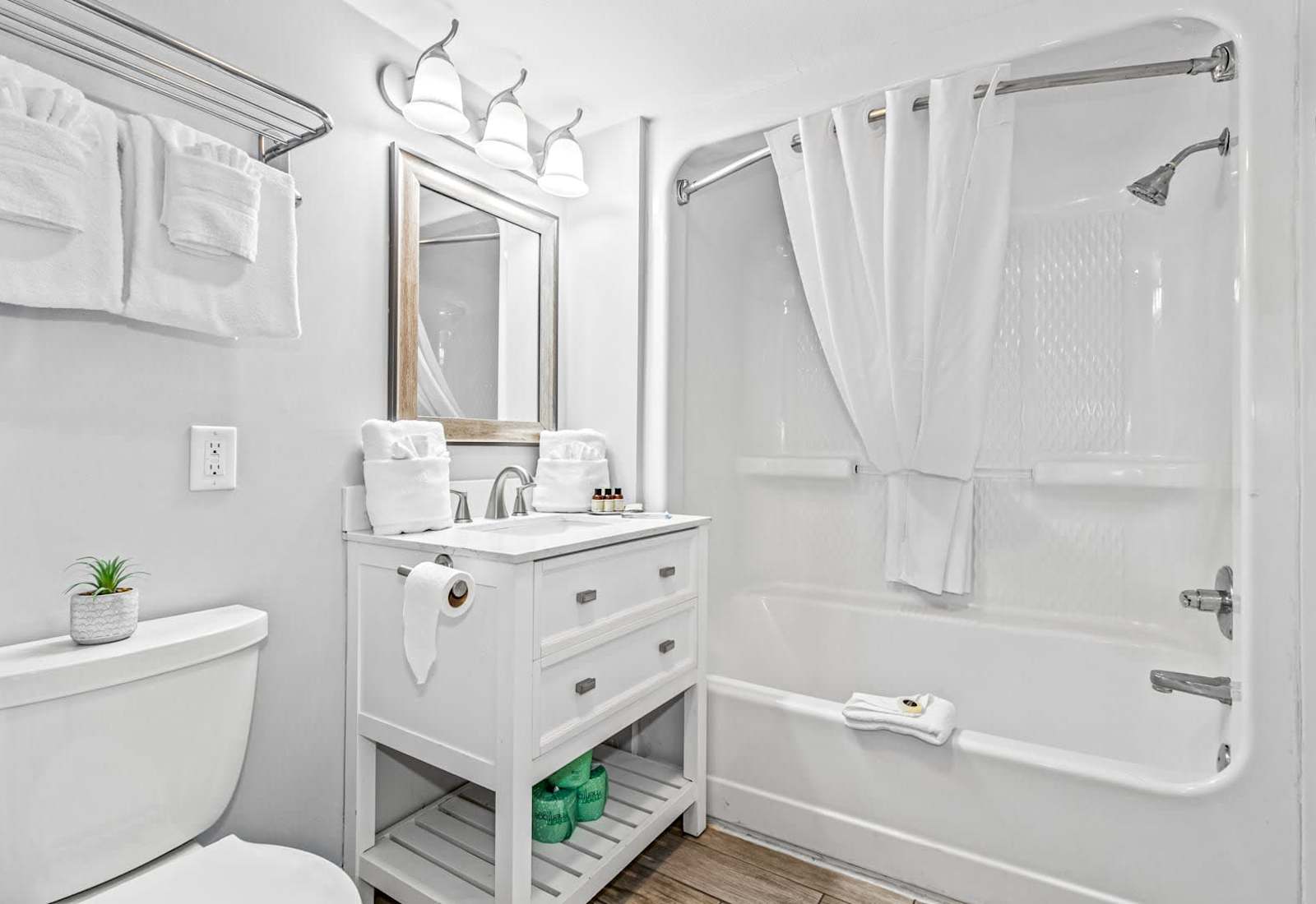 Freshen up in this sparkling clean bathroom featuring a sleek granite countertop, modern fixtures, and a full shower/tub combo. Stocked with essentials to ensure a relaxing and hassle-free stay!