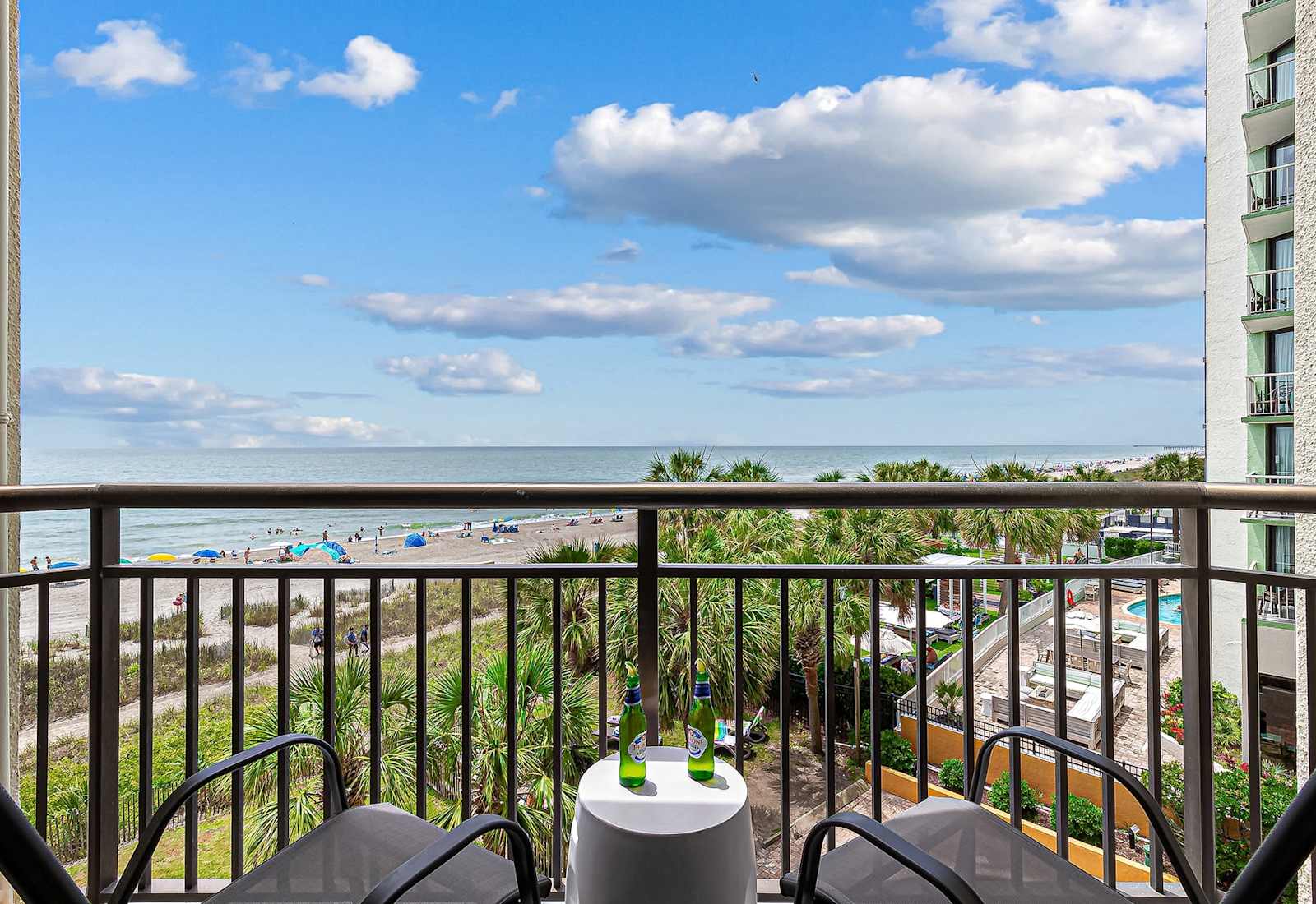 Sip, relax, and soak in the view from your private balcony overlooking the beach and pool. The perfect spot to start your day or unwind with an evening drink as the sun sets over the ocean.