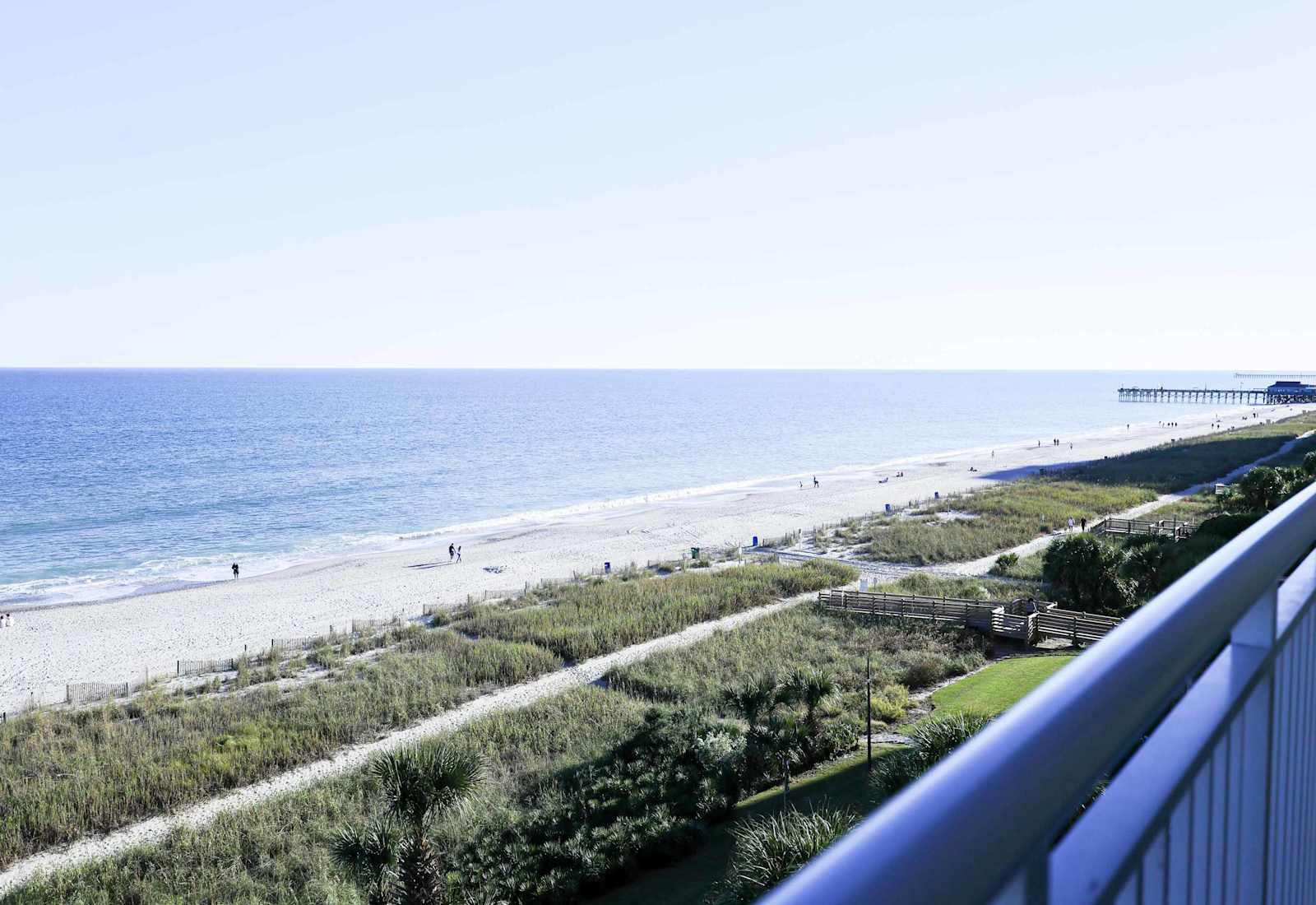 Front-row seat to paradise! Enjoy breathtaking ocean views from your private balcony—perfect for sunrise coffee or sunset wine. Just steps from the sand!