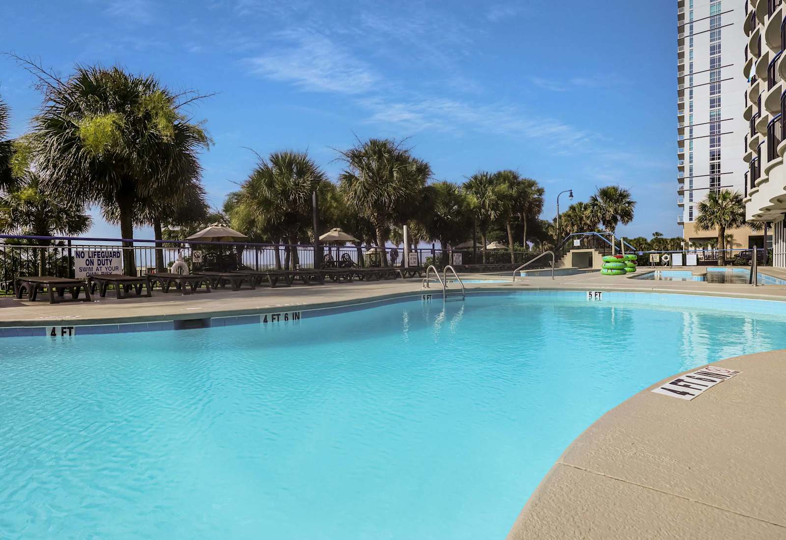 
Soak up the sun and unwind by the sparkling beachfront pool—just steps from the sand! Perfect for morning swims, afternoon lounging, and sunset dips in paradise.