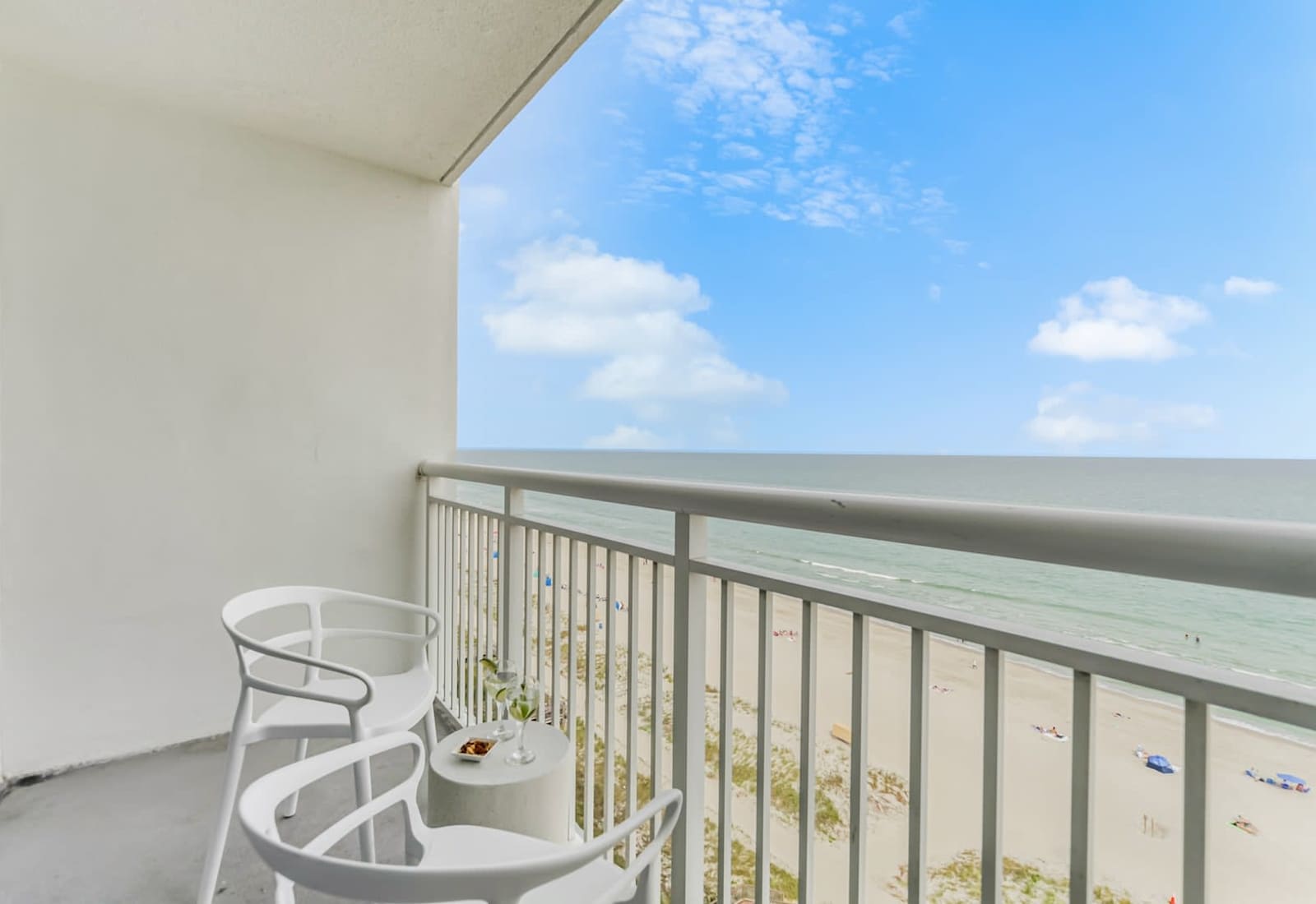 Enjoy breathtaking ocean views from your private balcony, just steps from the sandy beach. Perfect for relaxing mornings and sunset strolls. 
