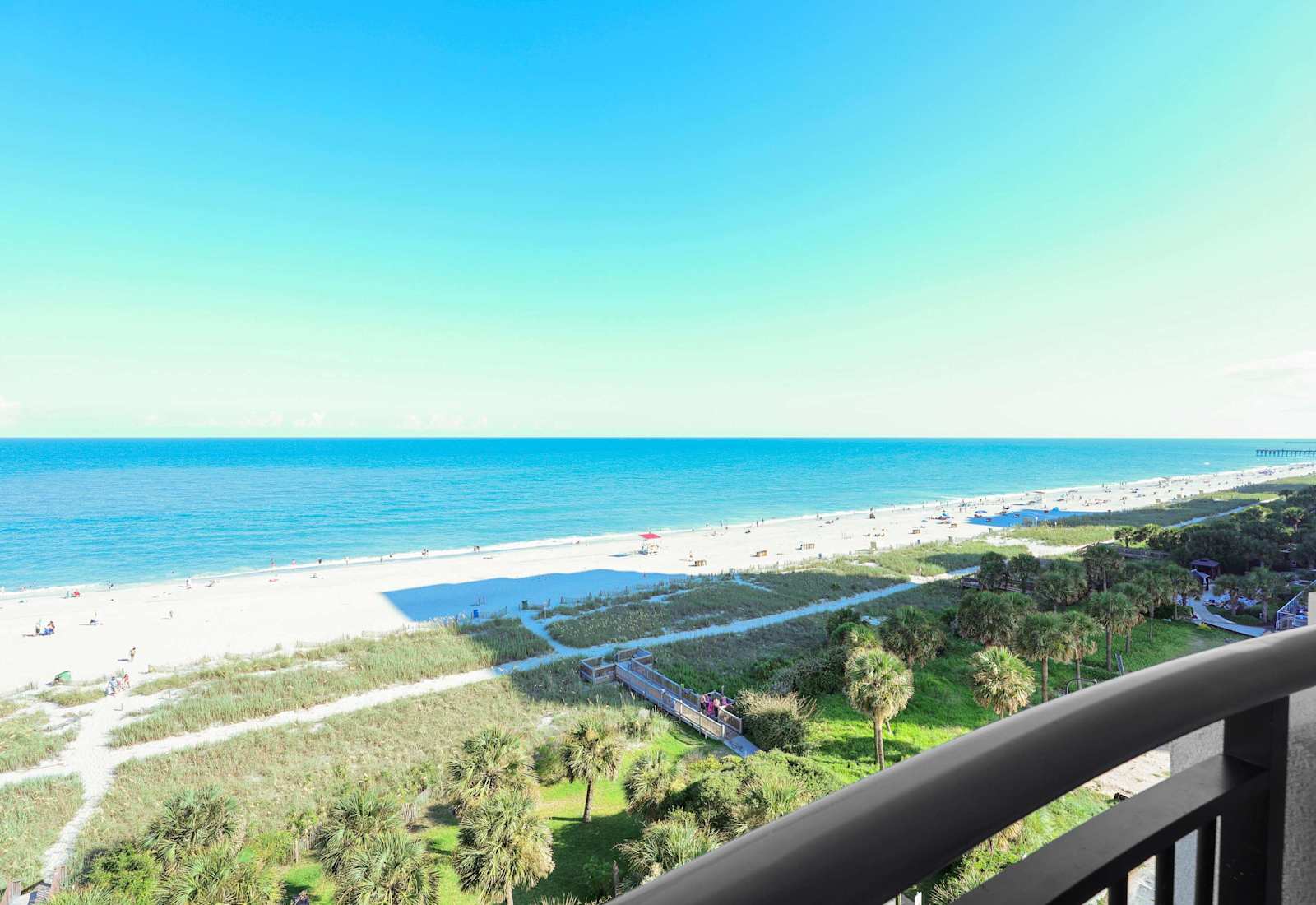 Wake up to stunning panoramic views of Myrtle Beach from your private balcony! Just steps to the sand, this oceanfront Airbnb is your front-row seat to paradise. Perfect for beach lovers and sunseekers!