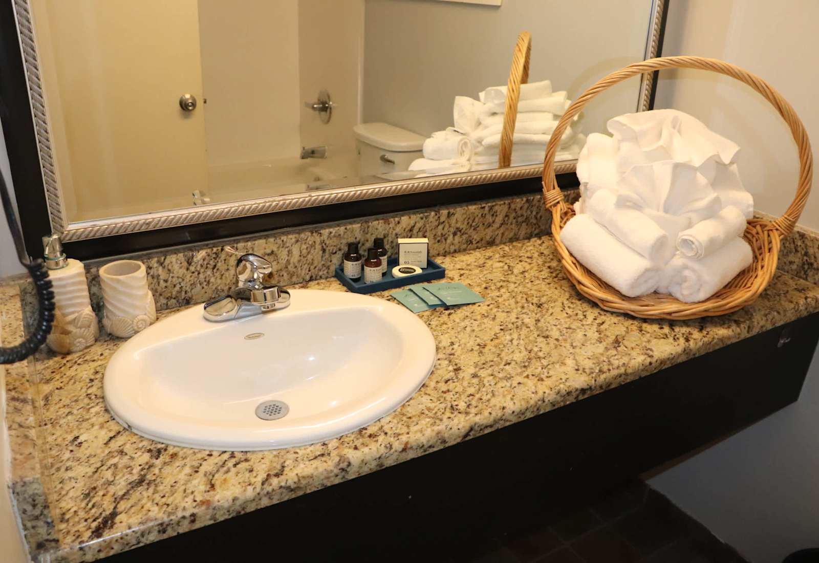 Refresh and unwind in a thoughtfully appointed bathroom featuring upscale amenities, premium toiletries, and plush 14lb towels designed to bring resort-quality comfort to every stay.