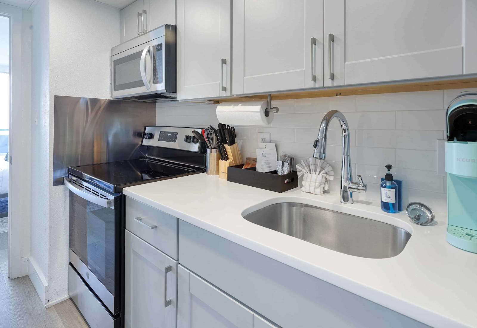 Modern kitchen with stainless steel appliances, perfect for cooking up a storm. 