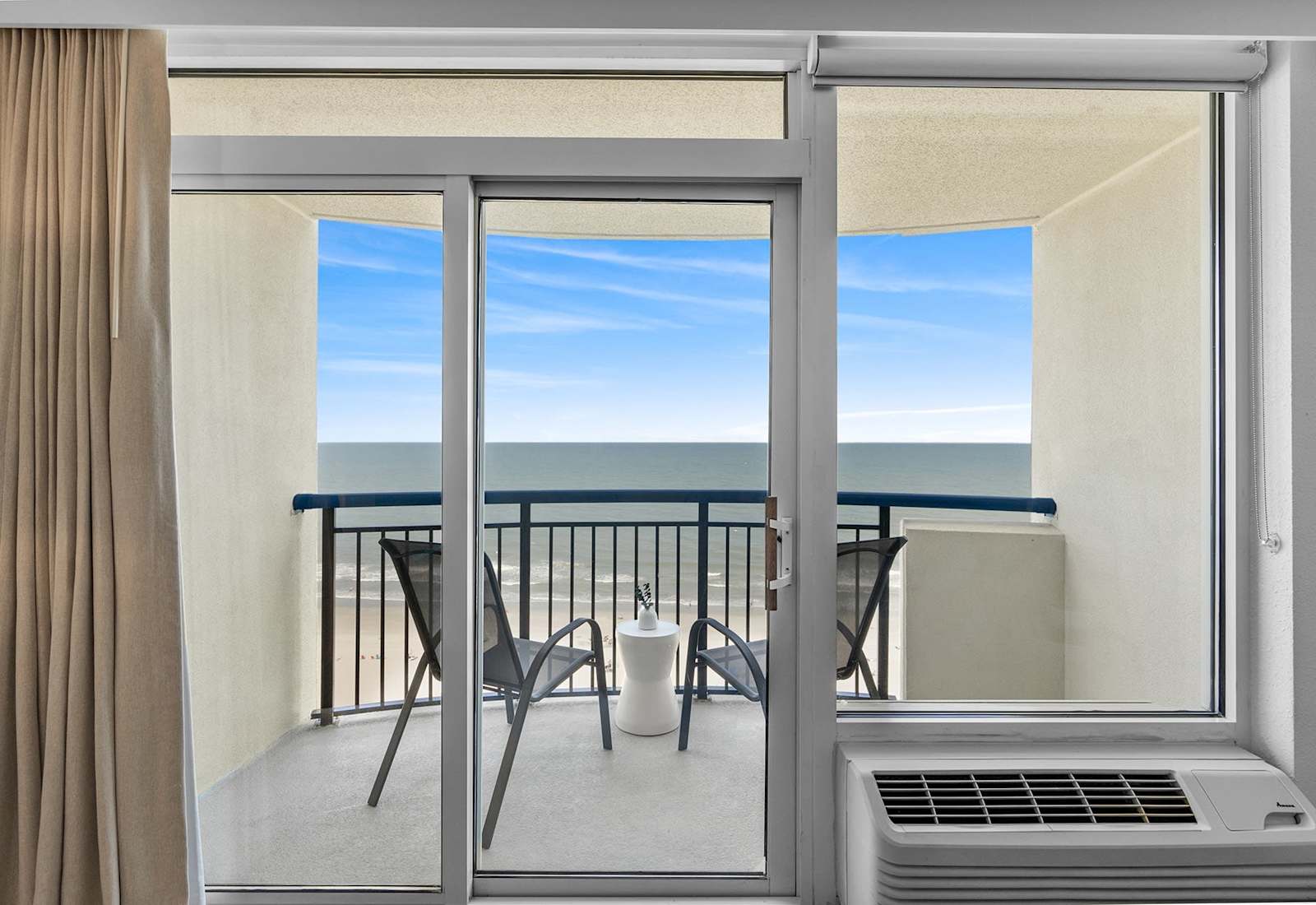 Relax and unwind with panoramic ocean views from your private balcony.