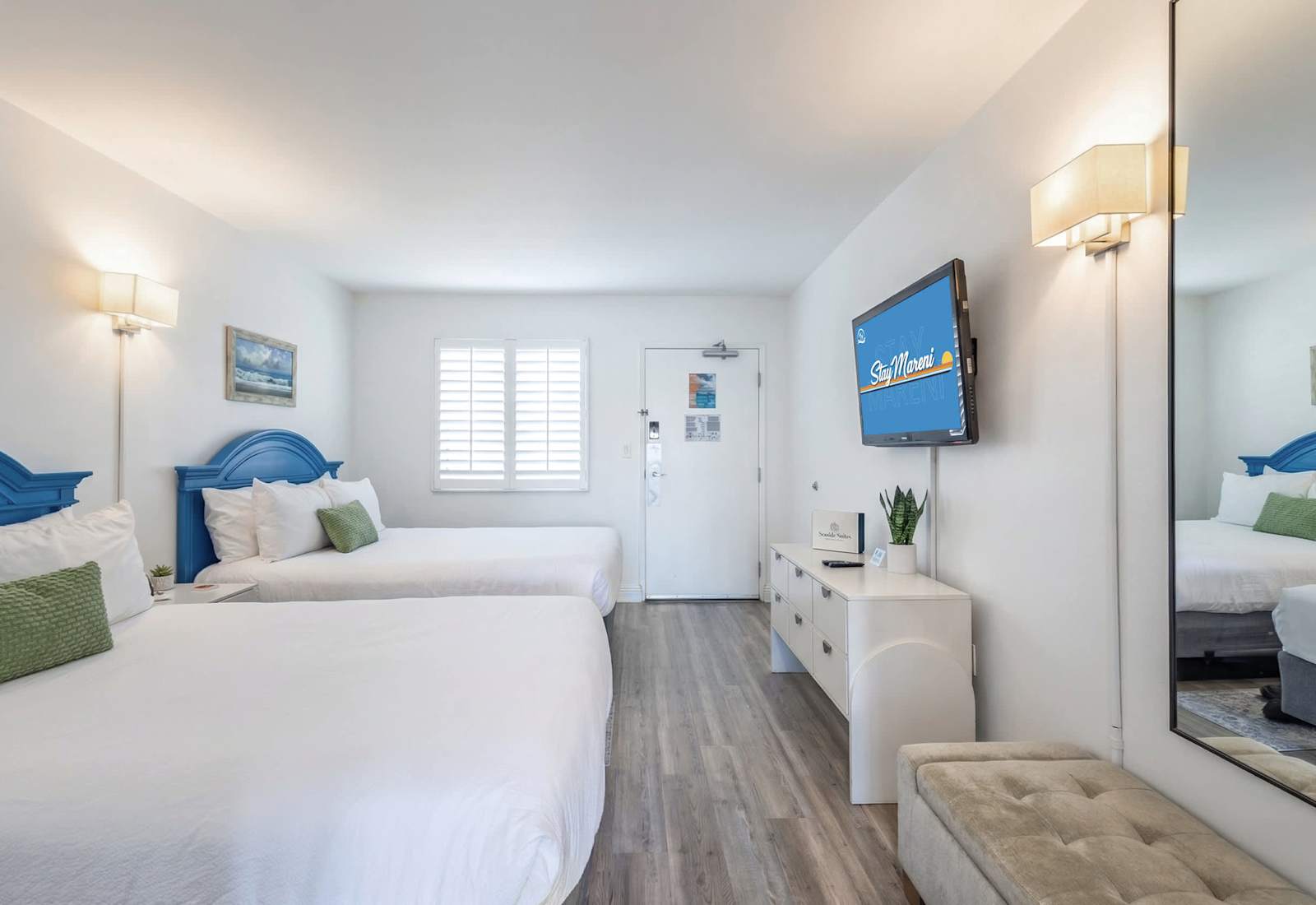 Drift off to sleep in comfort in this inviting bedroom with coastal charm! Featuring two plush beds and soothing decor, it’s perfect for families or friends seeking relaxation. Wake up refreshed and ready to explore your beachside escape!