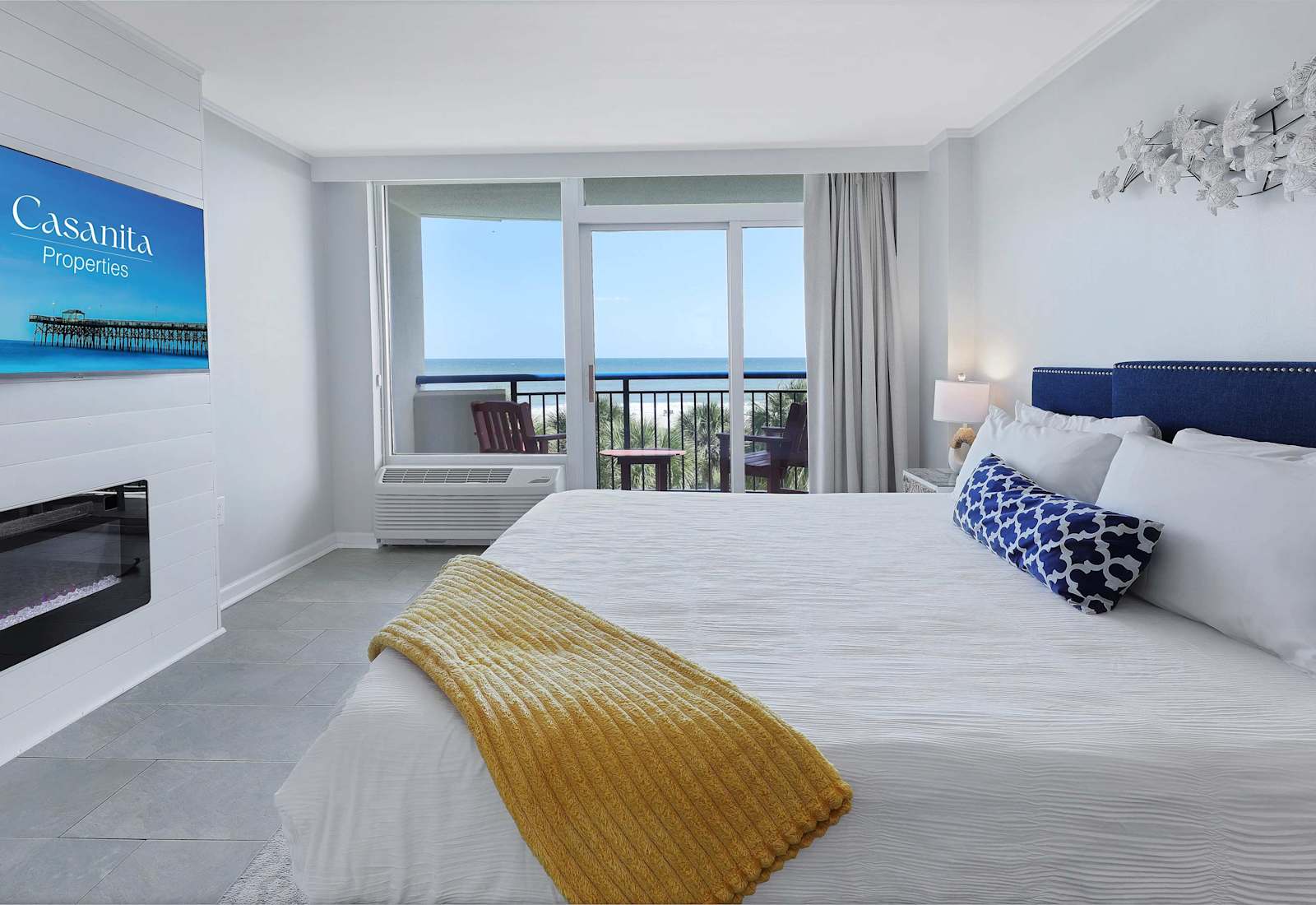 Chic, coastal, and oh-so-comfy—this king suite is your personal slice of beachside luxury. With boho touches and a stylish bar nook, it's the perfect vibe for sipping, sleeping, and soaking up the good life. 