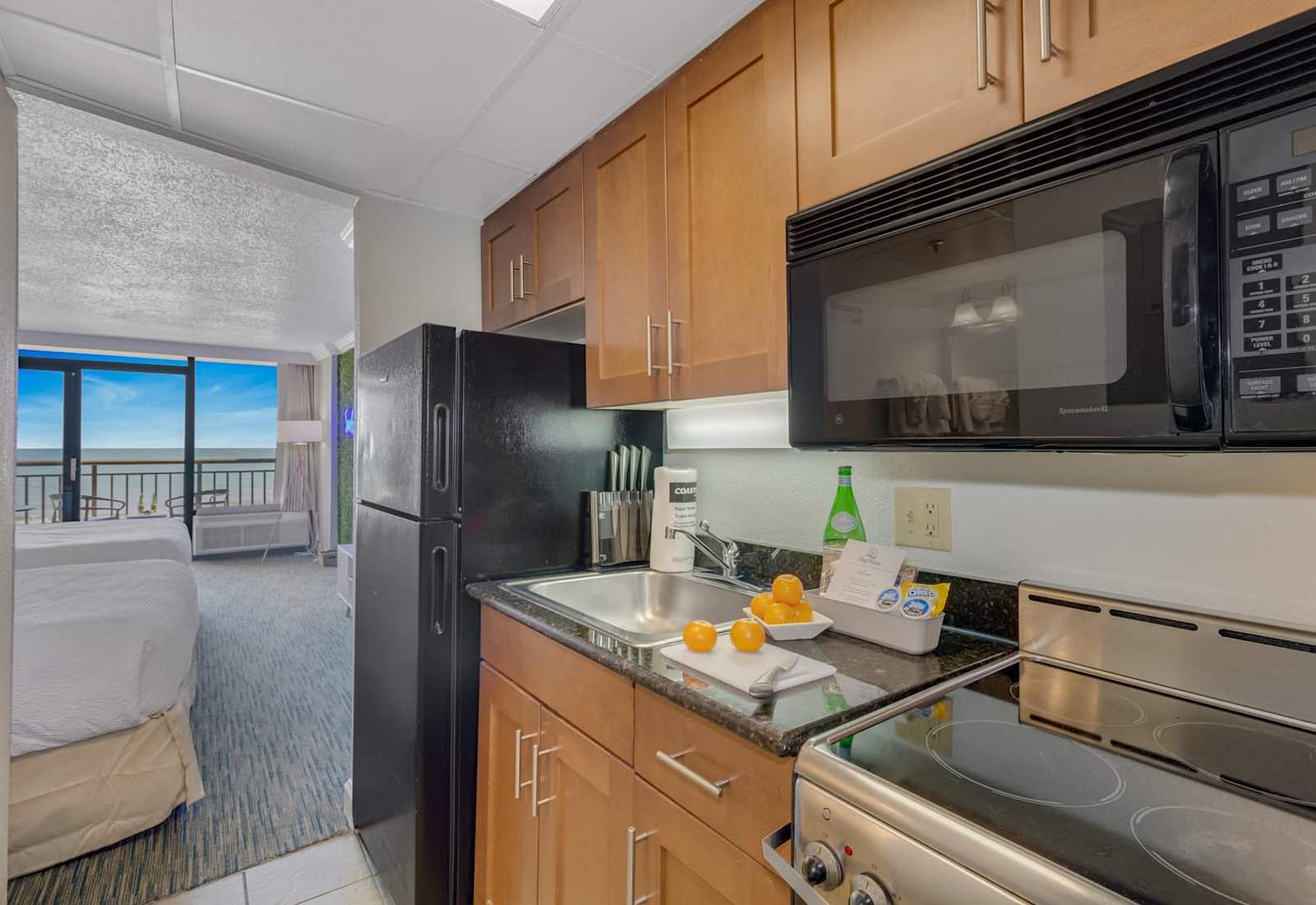 Bright, open kitchen with modern appliances and stunning ocean views. Perfect for cooking up a storm while enjoying the coastal breeze. 
