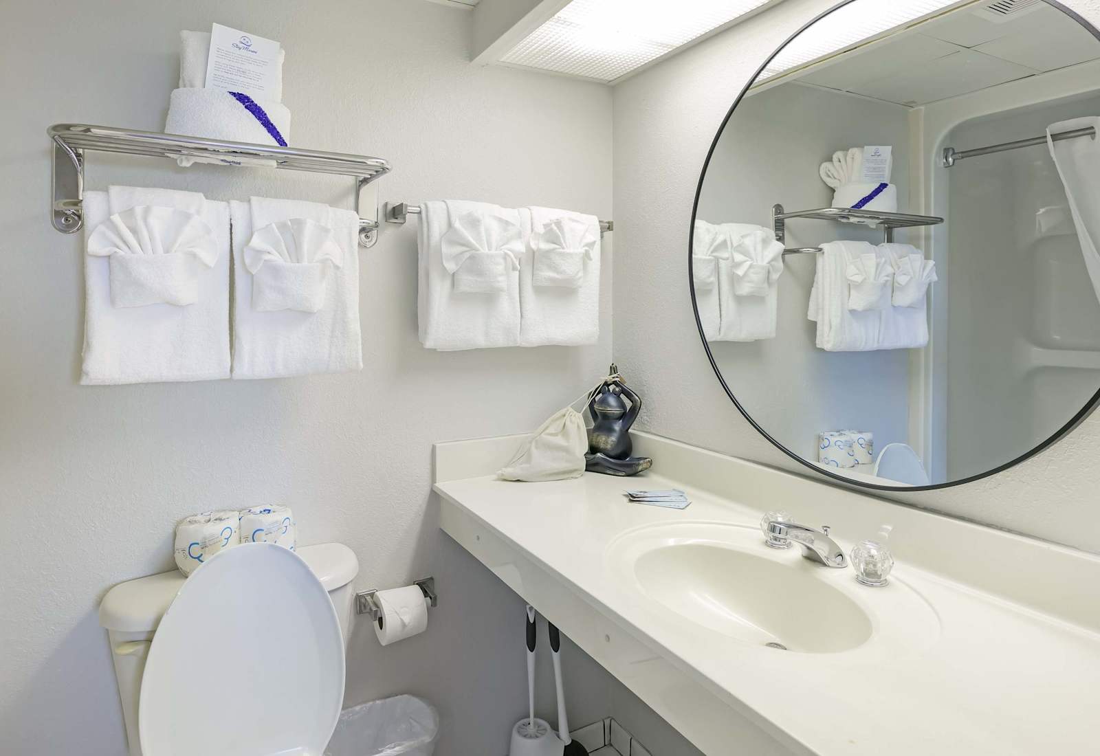 Start your day in this fresh, hotel-style bathroom stocked with crisp towels, beachy charm, and all the essentials. Clean, bright, and ready for your morning routine or post-sun refresh!