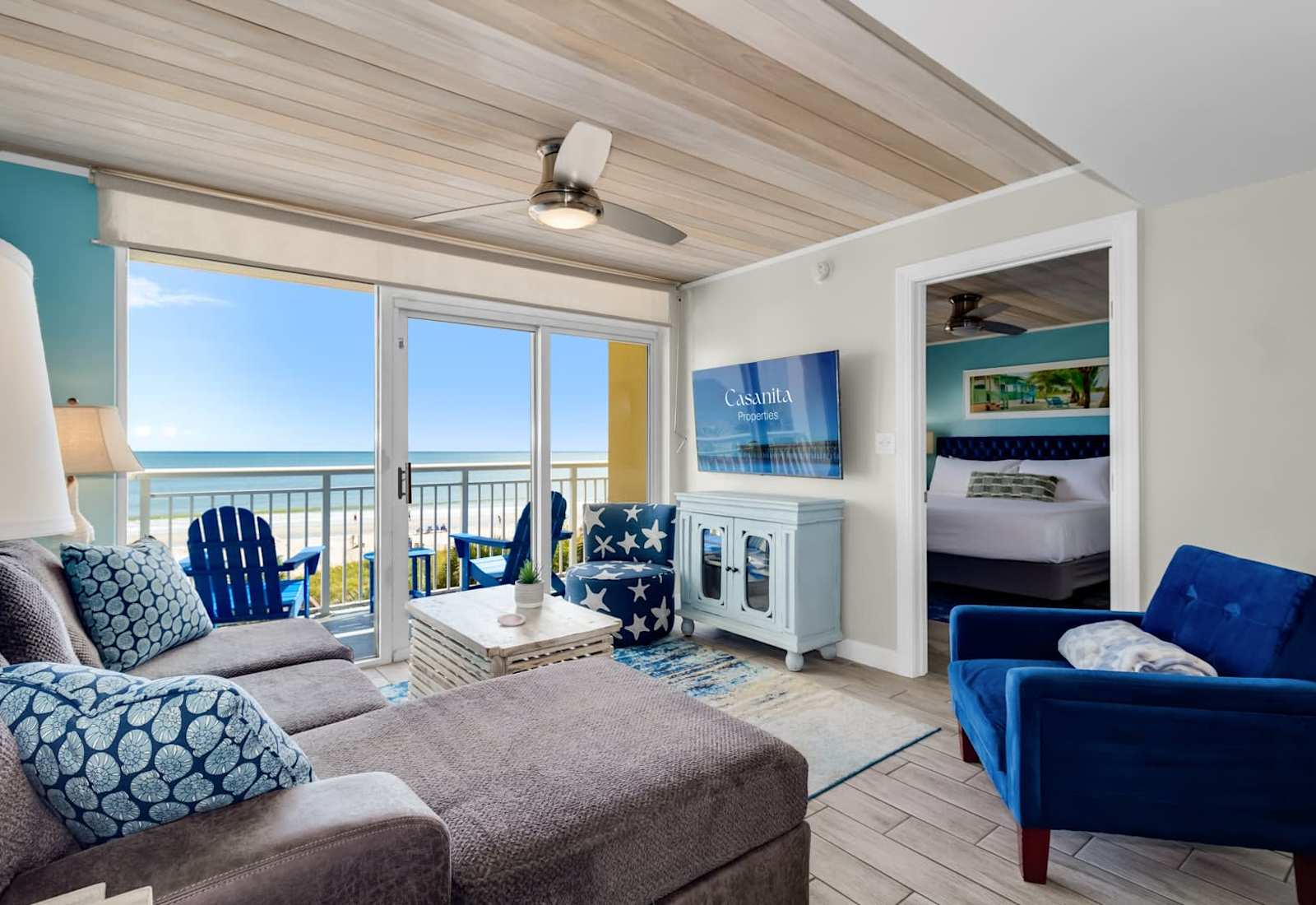 Immerse yourself in coastal luxury with this stunning living space! Featuring plush seating, vibrant nautical decor, and breathtaking ocean views from the balcony, this retreat combines comfort and style for the ultimate seaside getaway.