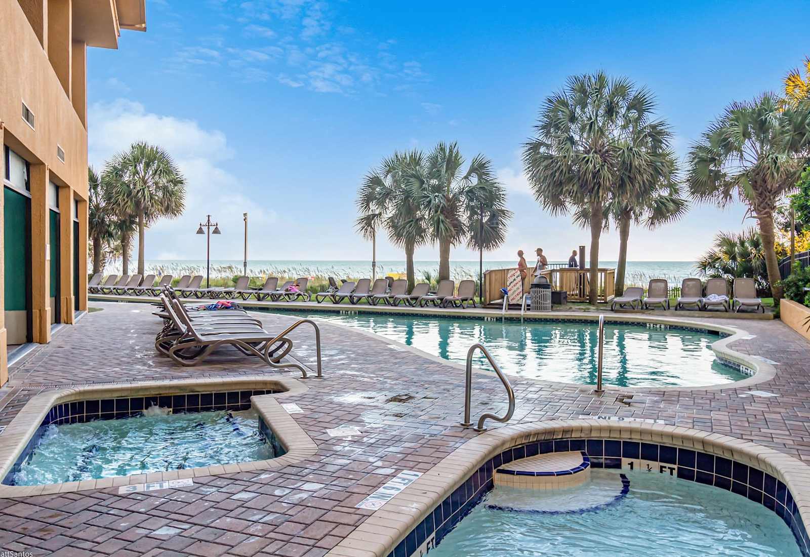 Enjoy the best of both worlds with this inviting pool just steps from the beach. Start your day with a refreshing dip or end it with a sunset swim under the coastal sky.