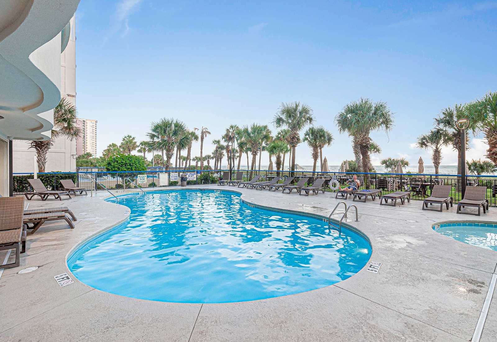 Soak up the sun with the ocean as your backdrop—this poolside paradise is just steps from the sand and calling your name. Lounge, splash, or simply unwind under the sway of the palms.
