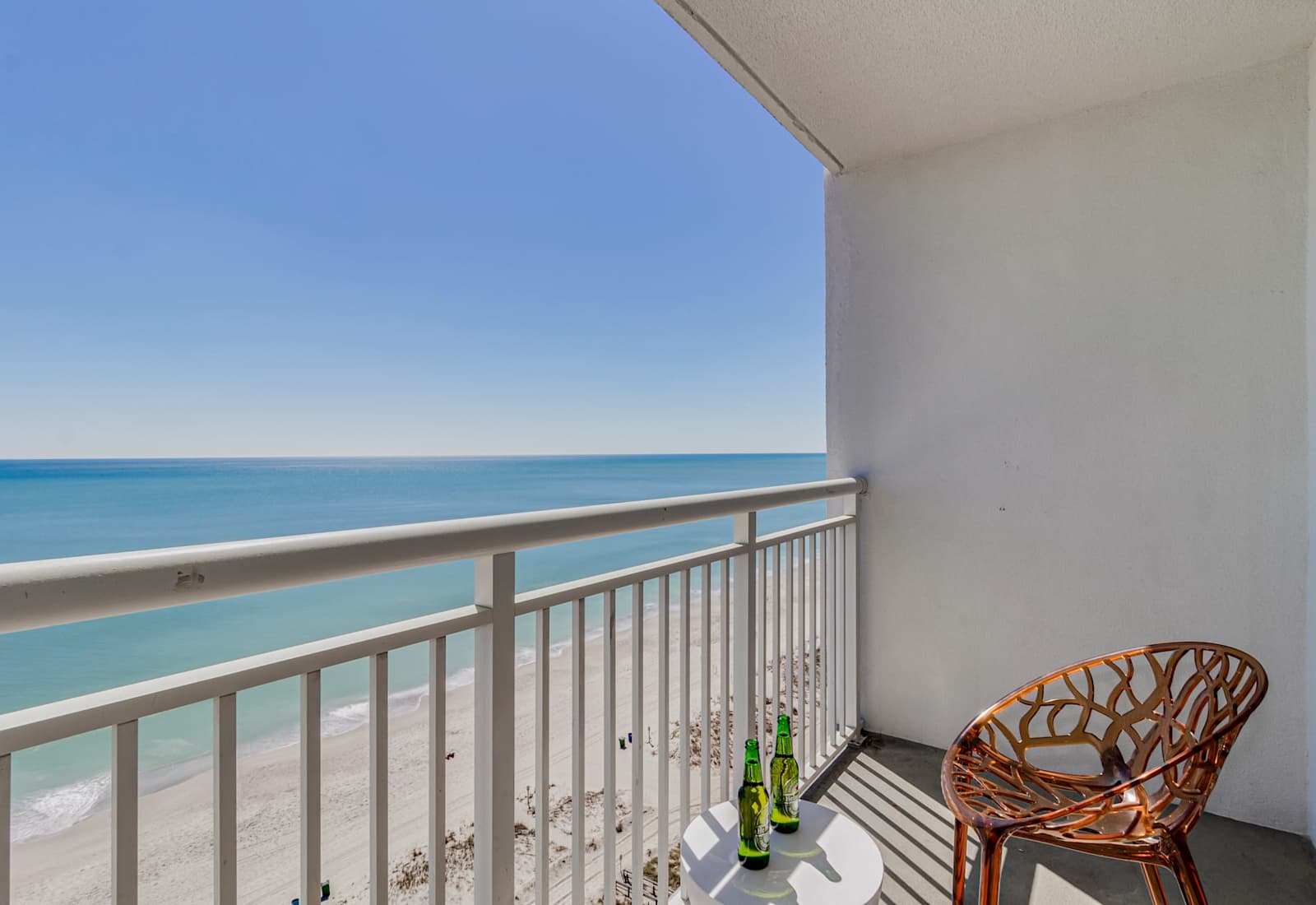 Enjoy breathtaking ocean views from your private balcony, just steps from the sandy beach. Perfect for relaxing mornings and sunset strolls. 