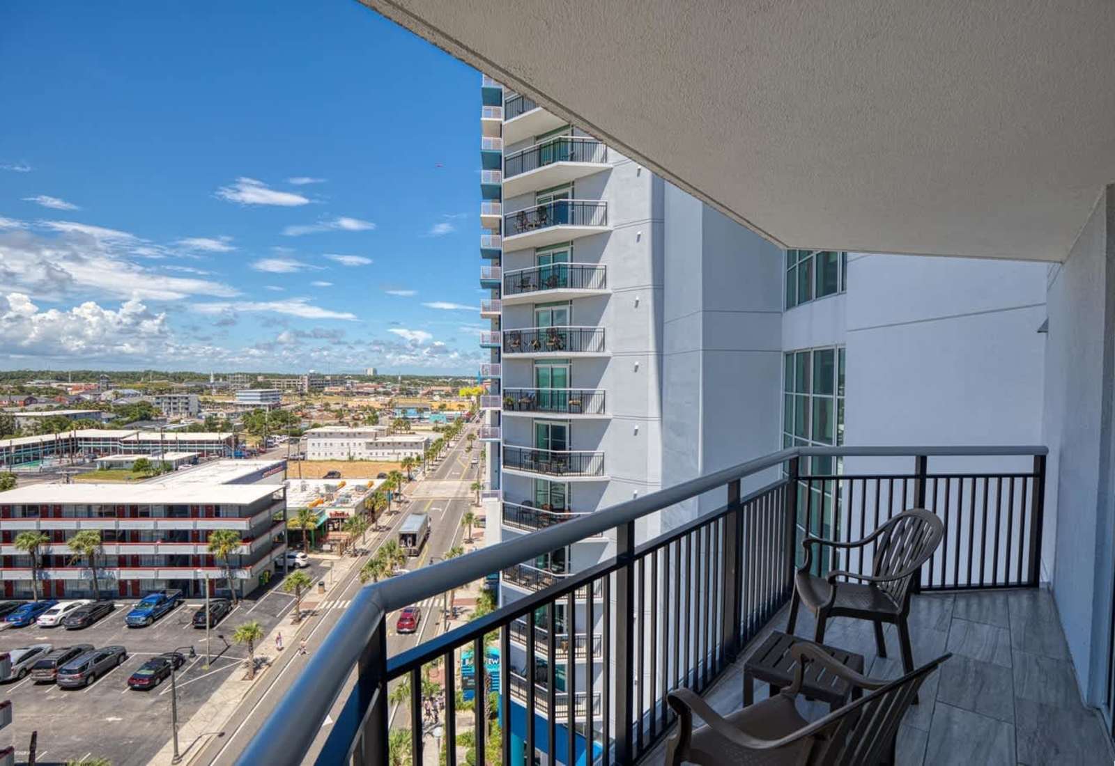 Your private balcony provides a city view—ideal for relaxing with a morning coffee.