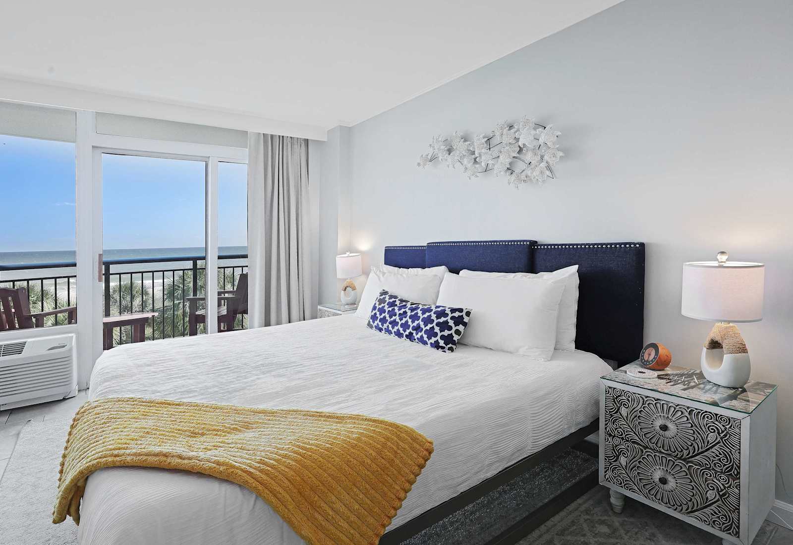 Wake up to ocean views, cozy up by the fireplace, and binge your favorite shows—all without leaving bed. This beachfront retreat has comfort and coastal vibes on lock. 