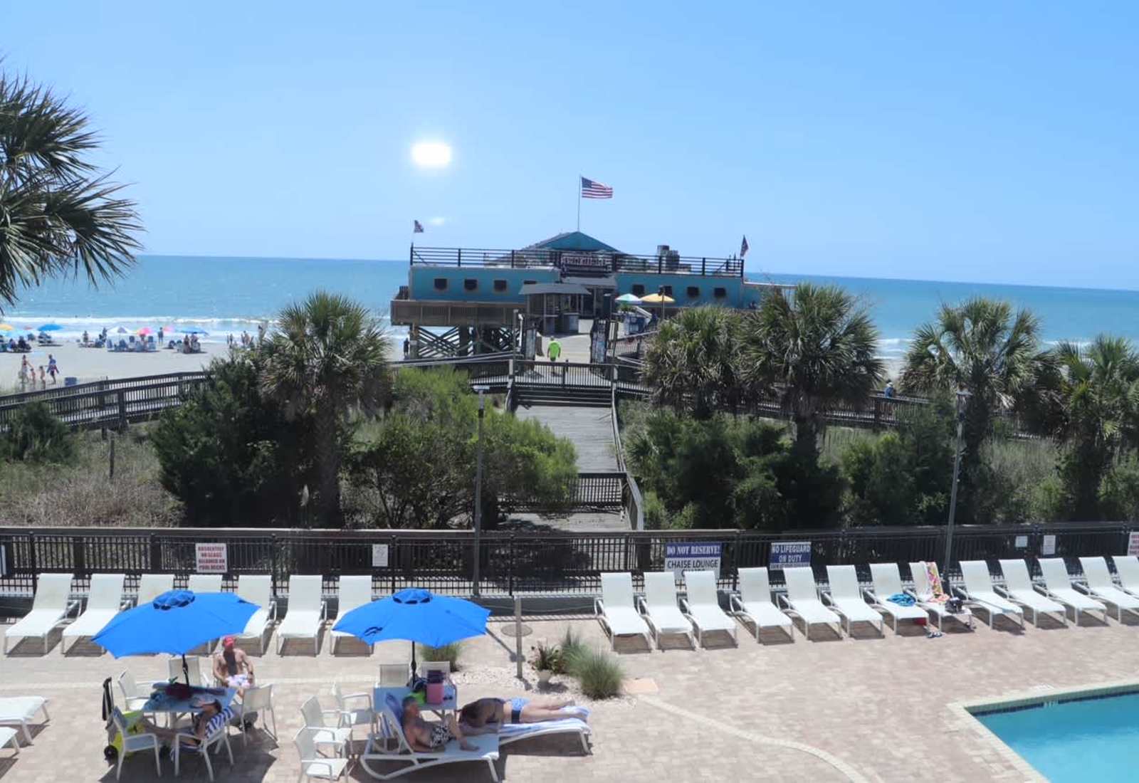 Wake up to breathtaking ocean views overlooking the iconic 14th Avenue Pier, with the sparkling pool deck and sandy shoreline just steps from your private Juliet balcony.