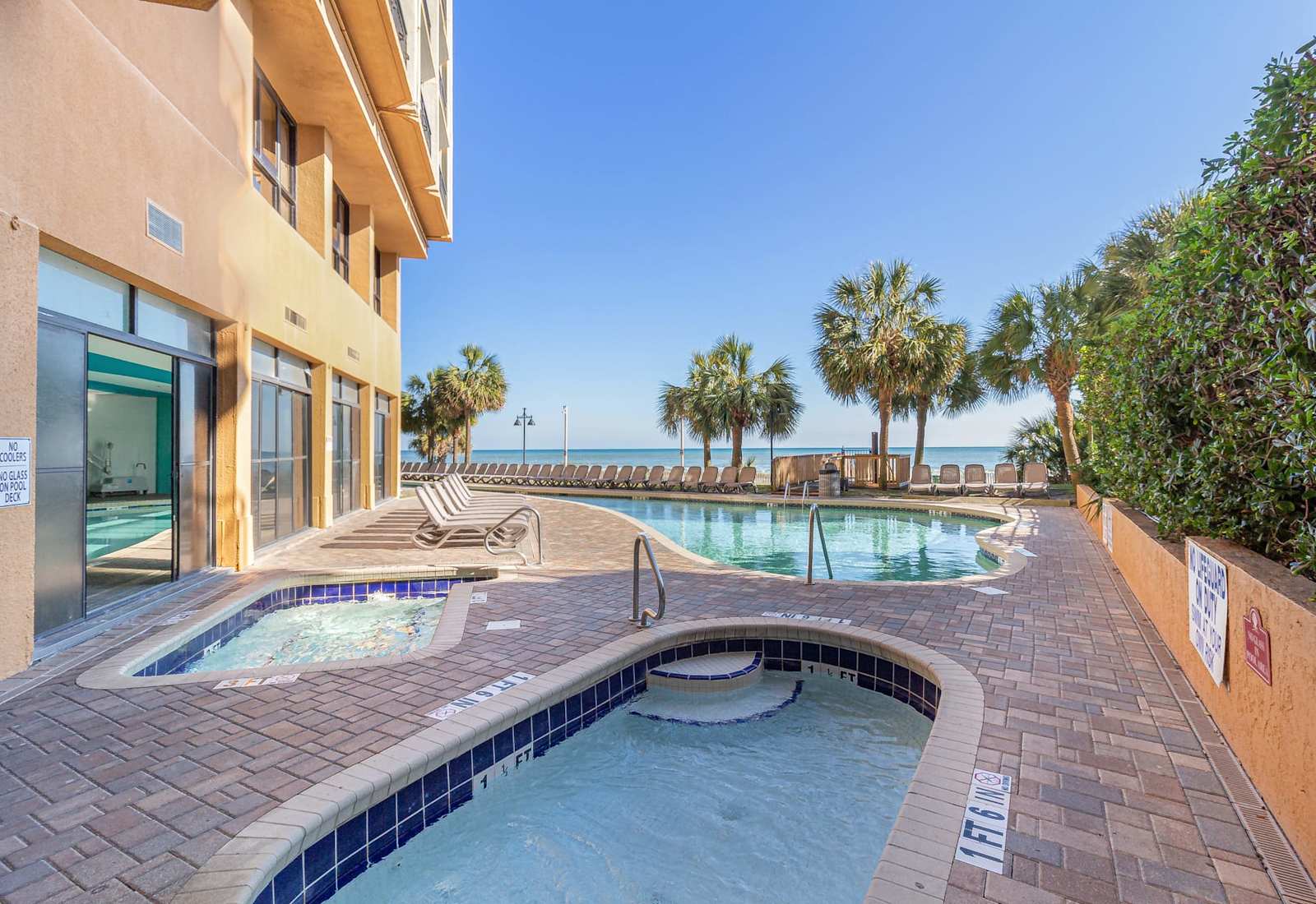 Multiple water features include indoor and outdoor pools, hot tubs and even a shallow pool for the kids!