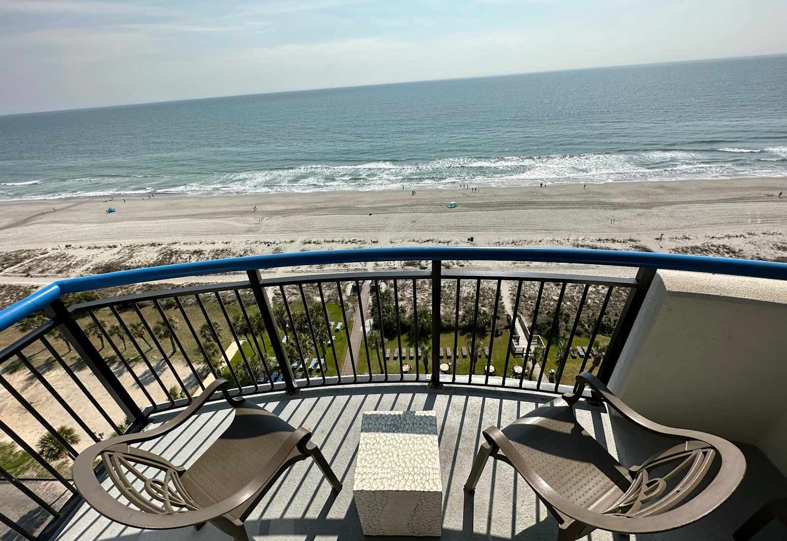 Enjoy stunning ocean views from your private balcony, perfect for relaxing and taking in the fresh air. 
