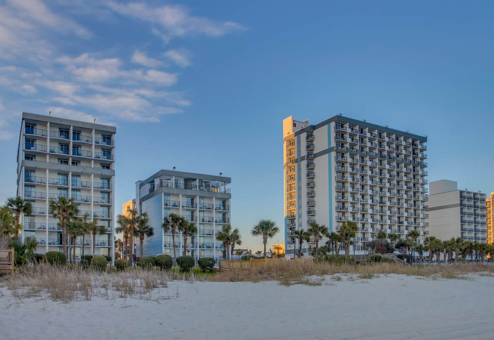 Wake up to the sound of waves and the golden glow of sunrise—this beachfront paradise puts you just steps from the sand, with views that belong on a postcard.