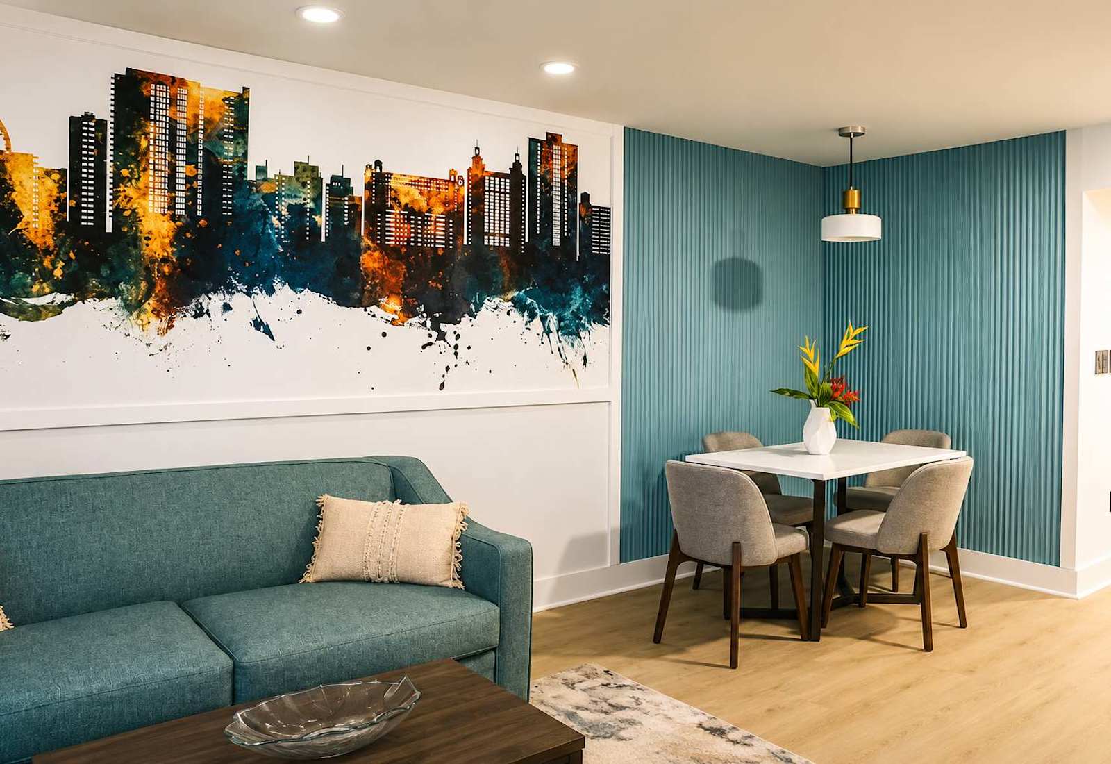 Relax in the stylish living area featuring a comfortable sofa, modern dining space, and coastal-inspired décor designed for your perfect beach getaway.
