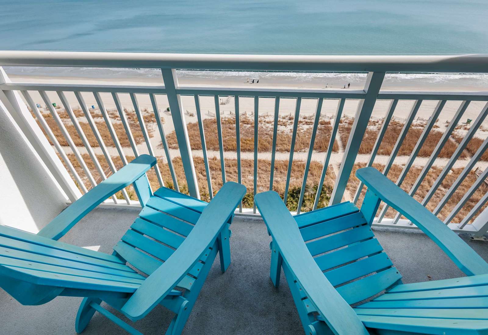 Step onto your private balcony and soak in breathtaking ocean views! Perfect for morning coffee or evening relaxation, this serene space lets you unwind to the sound of waves and the beauty of the beach right at your doorstep.