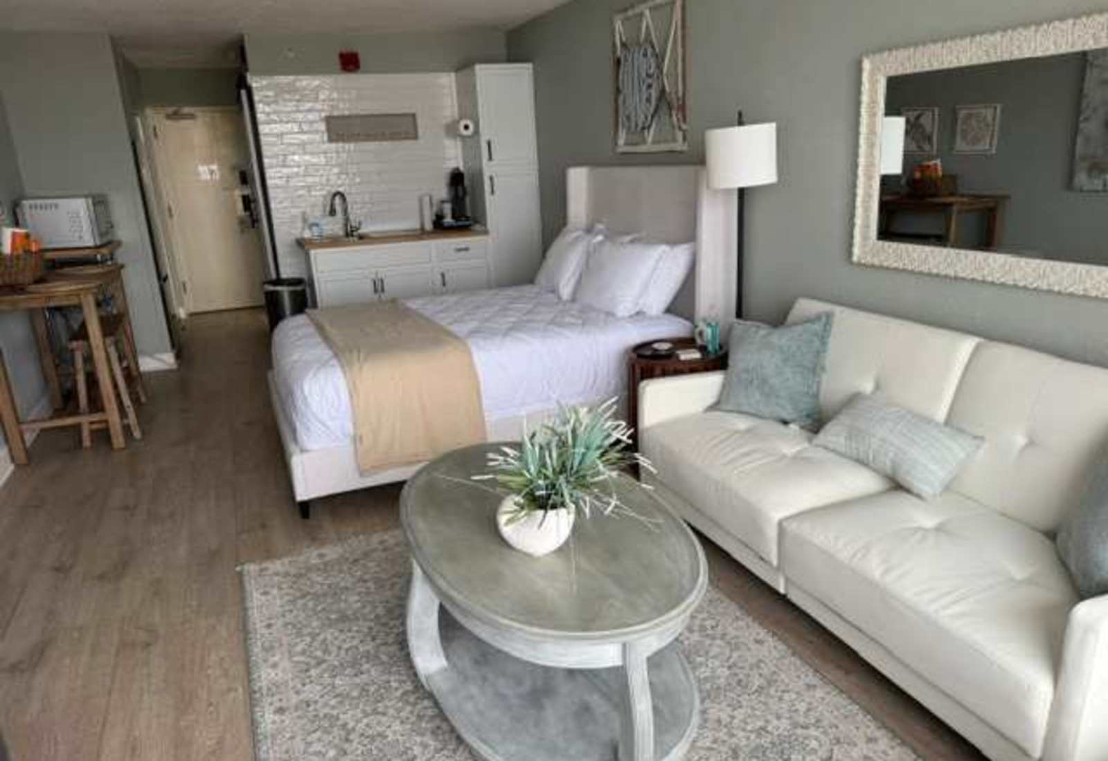 Cozy studio comfort featuring a plush queen bed