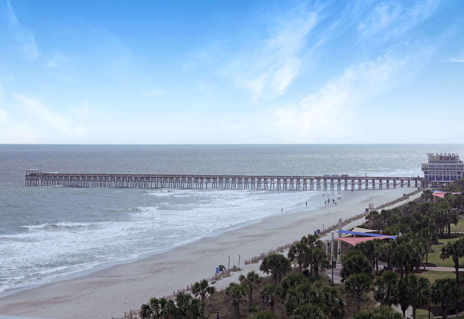 Wake up to breathtaking views of the iconic Myrtle Beach pier and coastline! Just steps from your stay, enjoy beach walks, ocean breezes, and unforgettable sunrise moments during your coastal getaway.