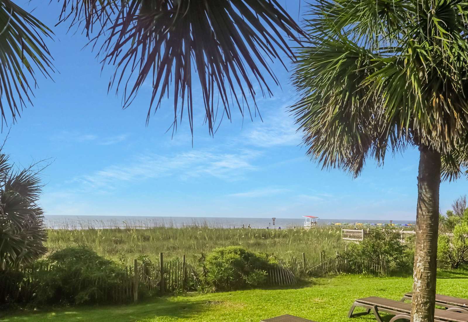 
Breathe in the ocean air and unwind under swaying palms—your private path to the beach is just steps away. Serenity, sunshine, and sea views await in this coastal escape!