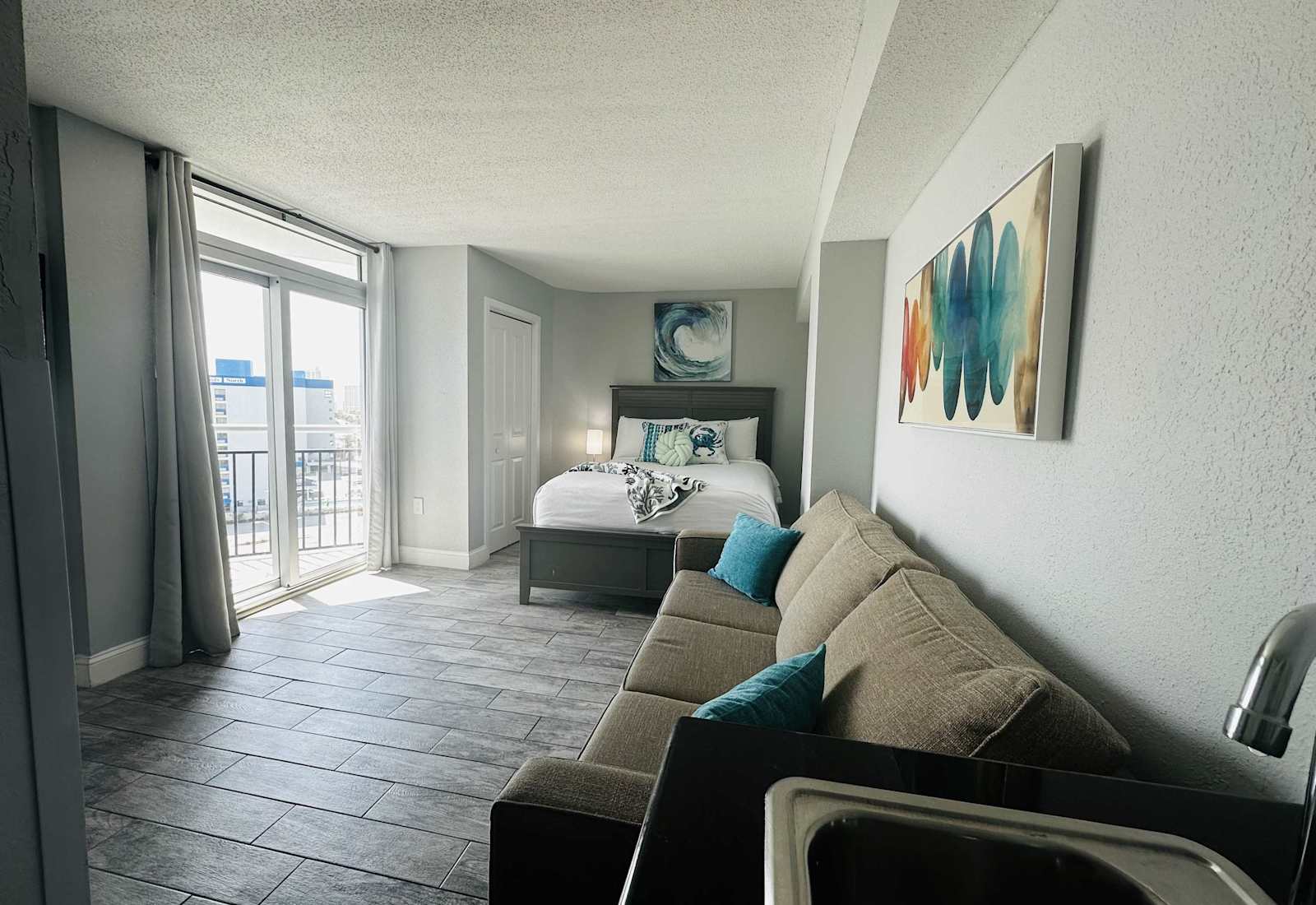 Wake up to ocean views in this bright and modern beachfront studio! Enjoy cozy comforts, a private balcony, and easy beach access—perfect for couples or solo travelers seeking the ultimate Myrtle Beach escape. 
