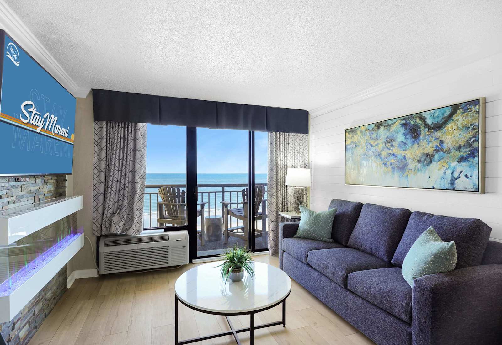 Wake up to ocean views in this stylish beachfront retreat featuring a cozy fireplace, smart TV, and private balcony. Perfect for a relaxing getaway or remote work with a view. Steps from the sand, surf, and sunshine.