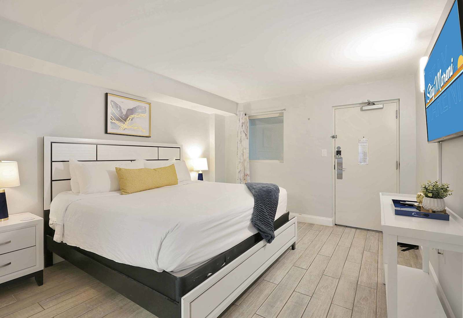 Rest easy in this modern and inviting bedroom featuring a plush king bed, stylish décor, and smart TV. The perfect place to recharge after a fun-filled day exploring Myrtle Beach’s sun, sand, and sights!