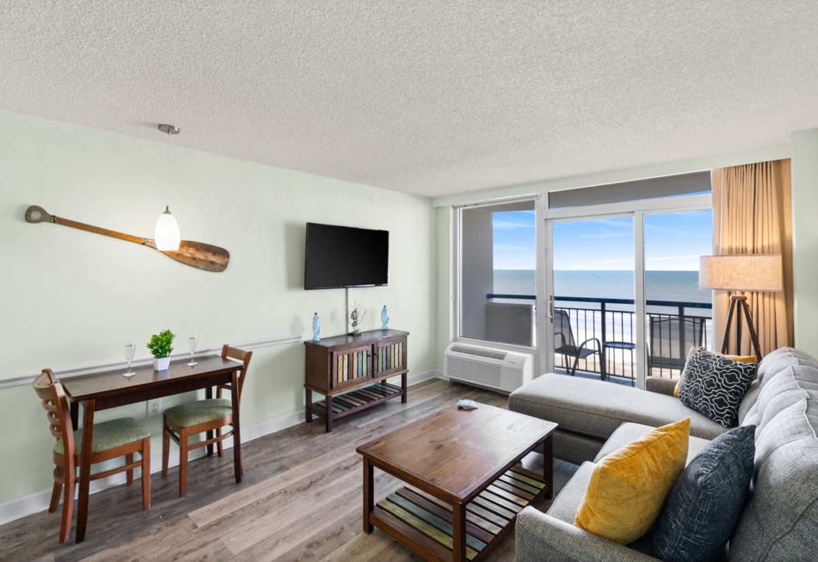Kick back in coastal comfort—this oceanfront living space pairs beachy charm with front-row Atlantic views, perfect for morning coffee, Netflix nights, or sipping wine while the sun melts into the waves.