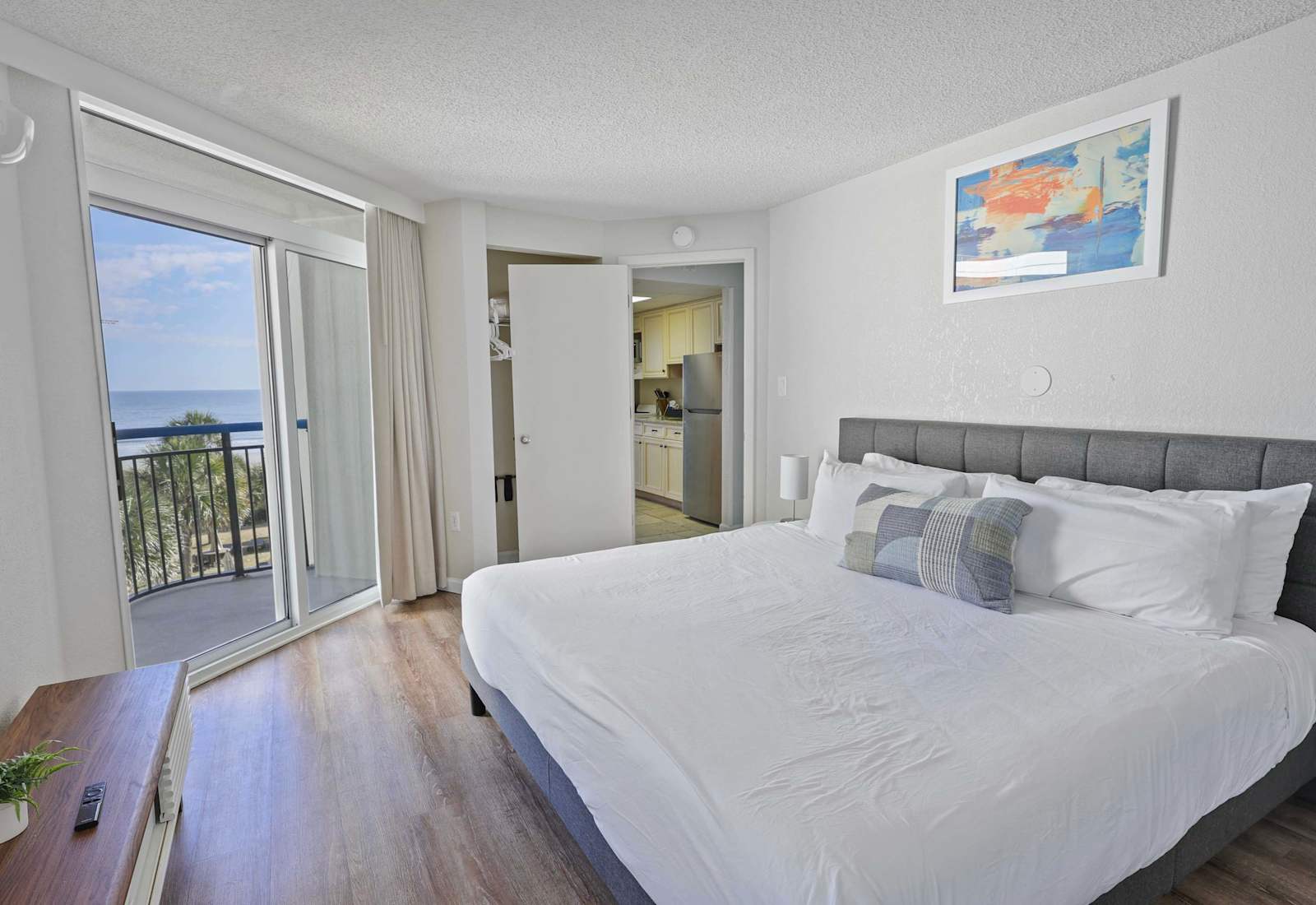 Mom & Dad can enjoy the convenience of the private bedroom with it's own balcony, while the kids use the Murphy bed in the living room as a second bedroom!