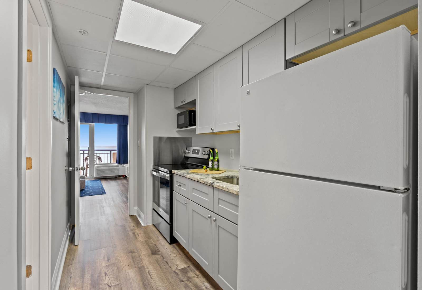 Fully-equipped kitchen with stainless steel appliances, perfect for cooking up a storm. 
