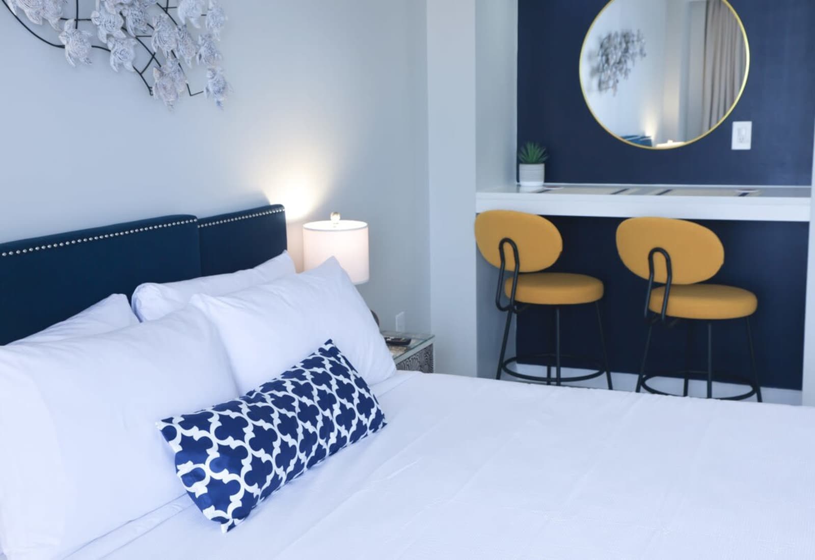 Sleep in style and sip your morning coffee at a chic built-in bar—this cozy corner is where plush comfort meets bold design and vacation vibes begin.