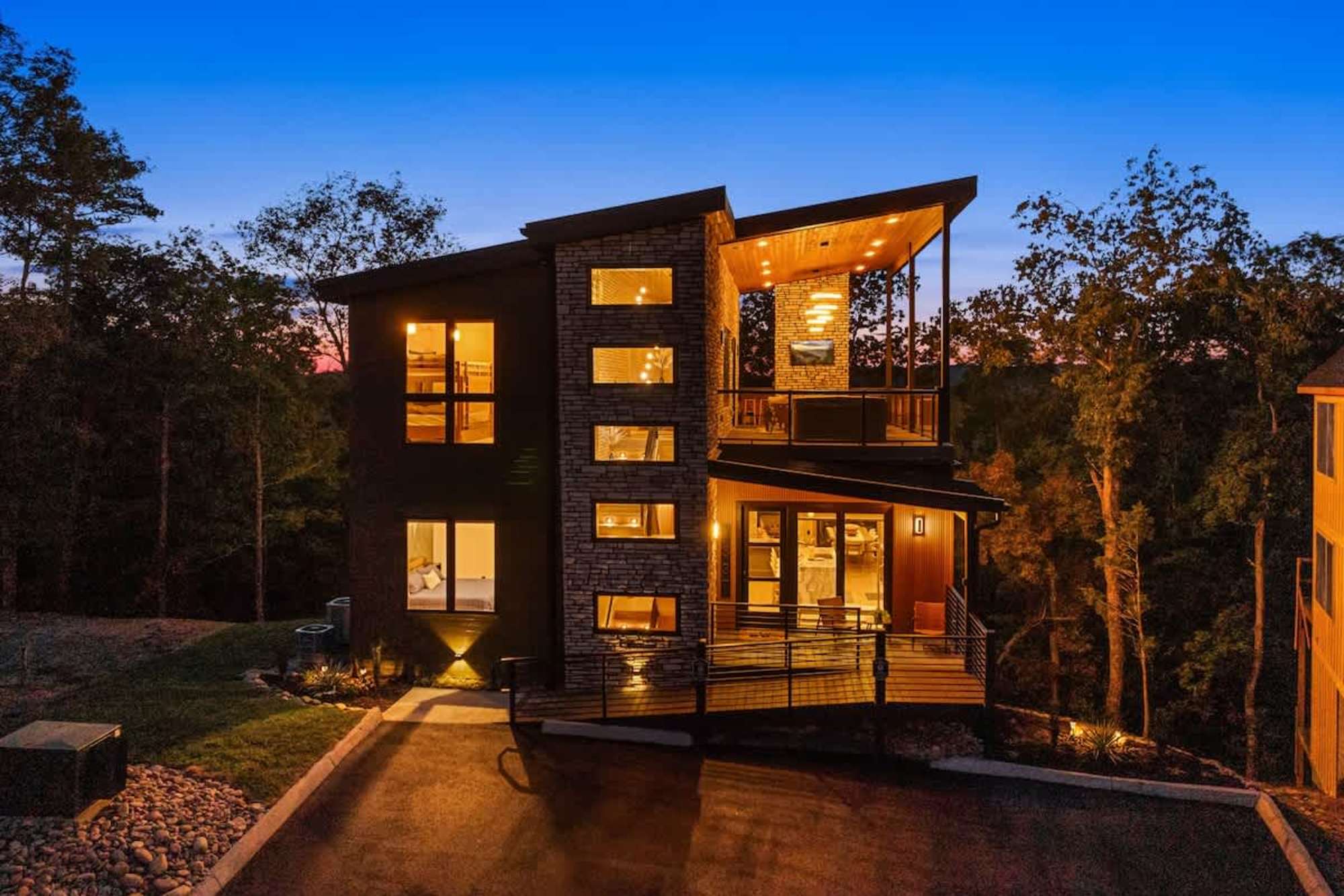 A luxury cabin in the Great Smoky Mountains at dusk